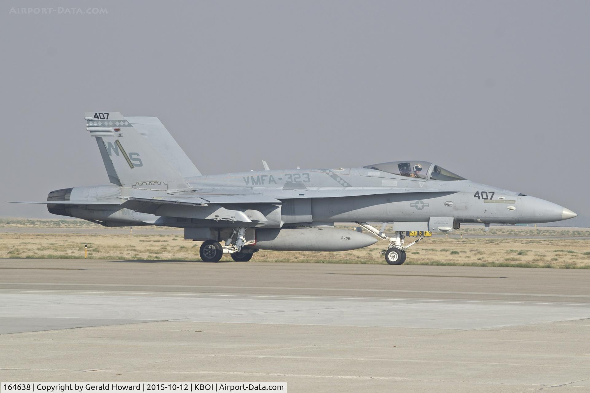 164638, McDonnell Douglas F/A-18C Hornet C/N 1056/C267, Taxiing from the south GA ramp.  VMFA-323 “Death Rattlers