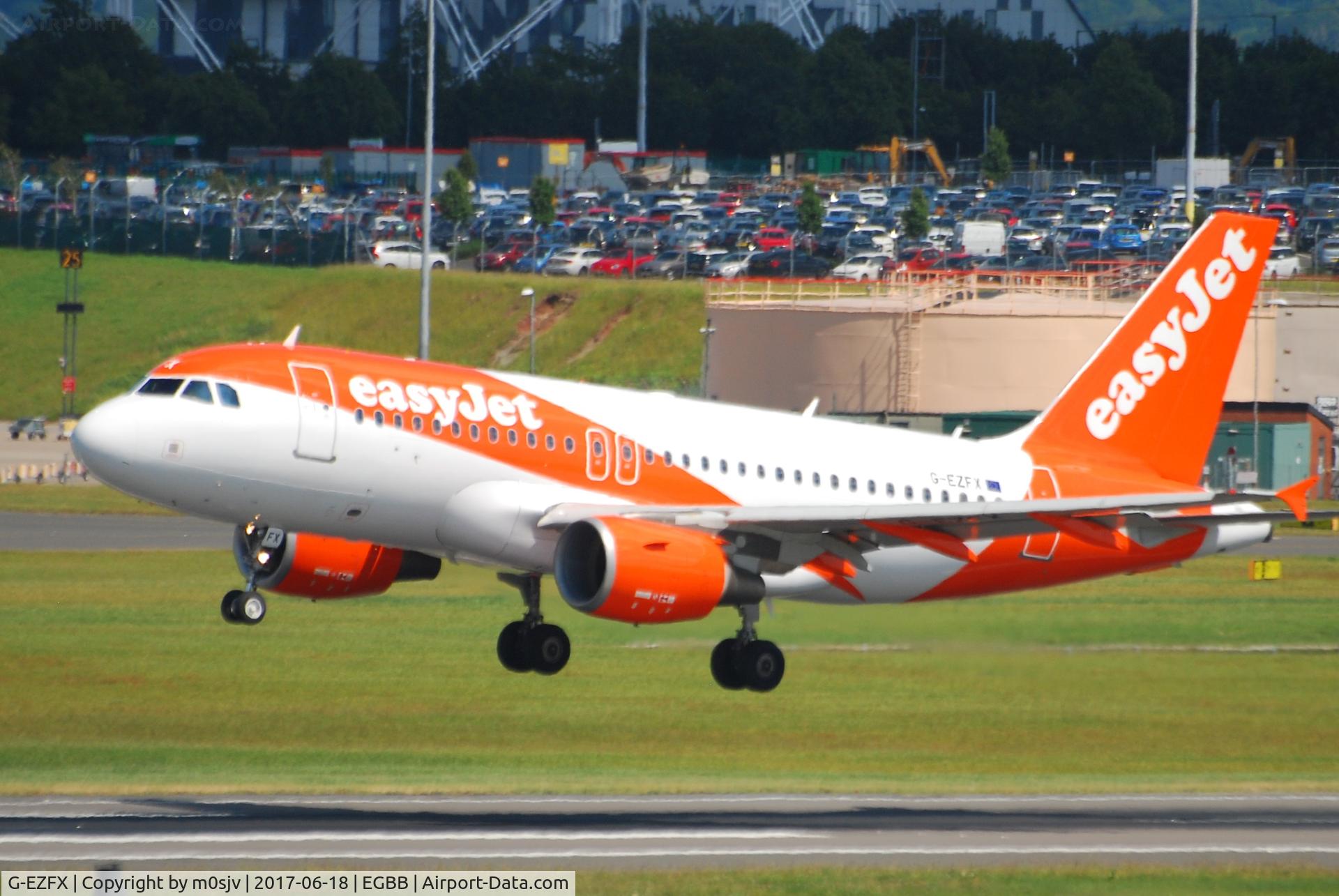 G-EZFX, 2010 Airbus A319-111 C/N 4385, Landing on 33