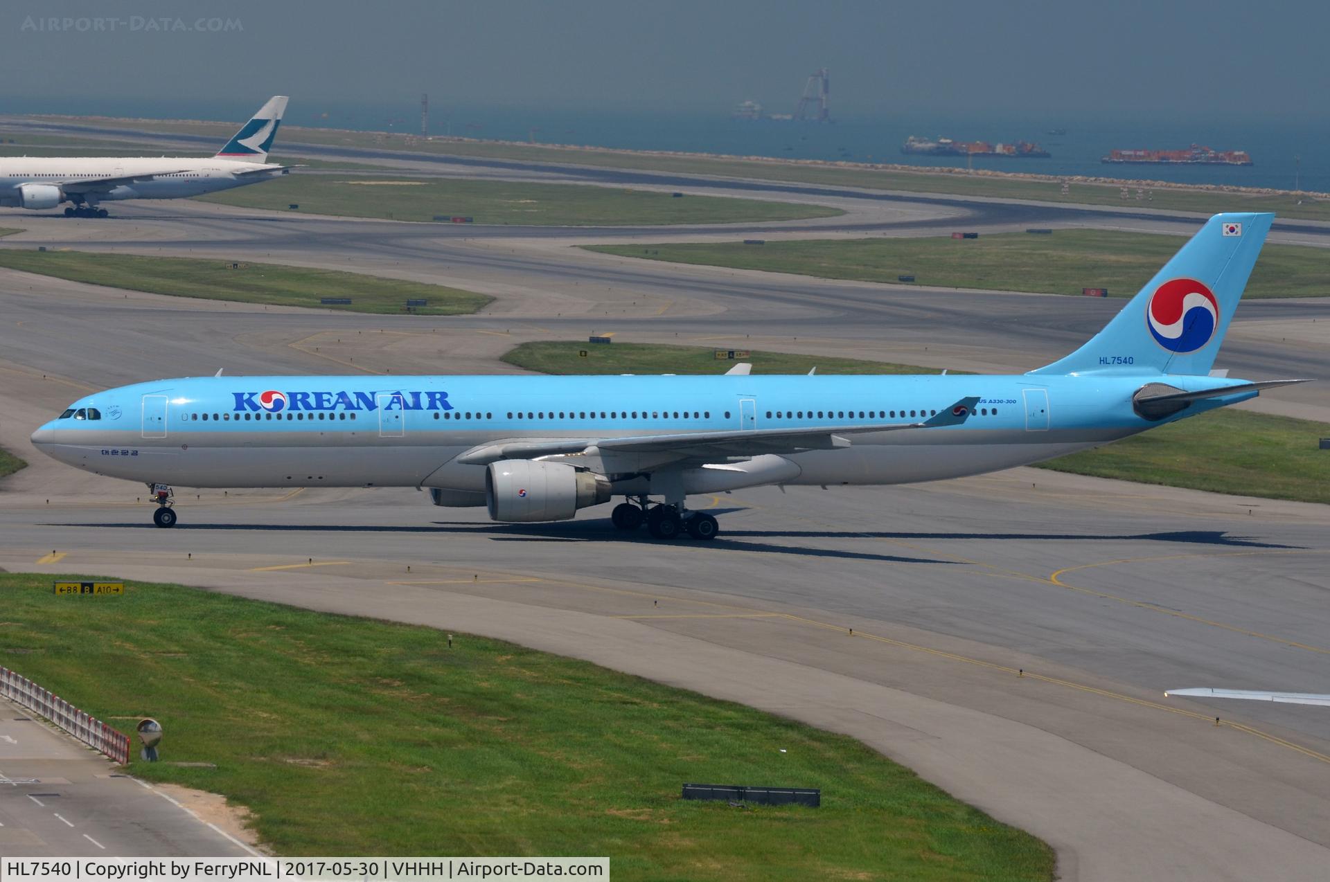 HL7540, Airbus A330-322 C/N 241, Korean A333 vacating the runway in HKG