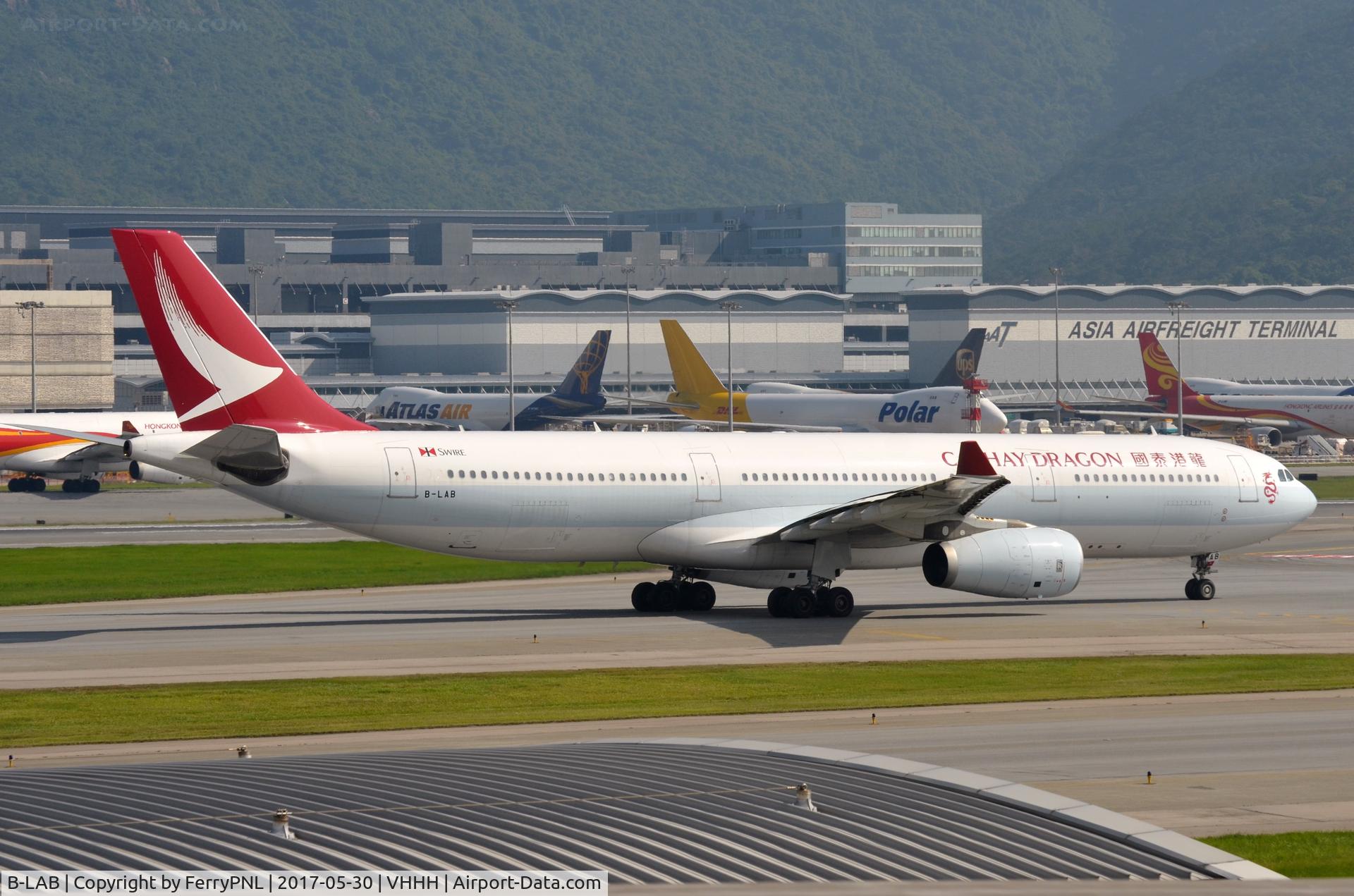 B-LAB, 2005 Airbus A330-343X C/N 673, Cathay Dragon A333 in its new uniform