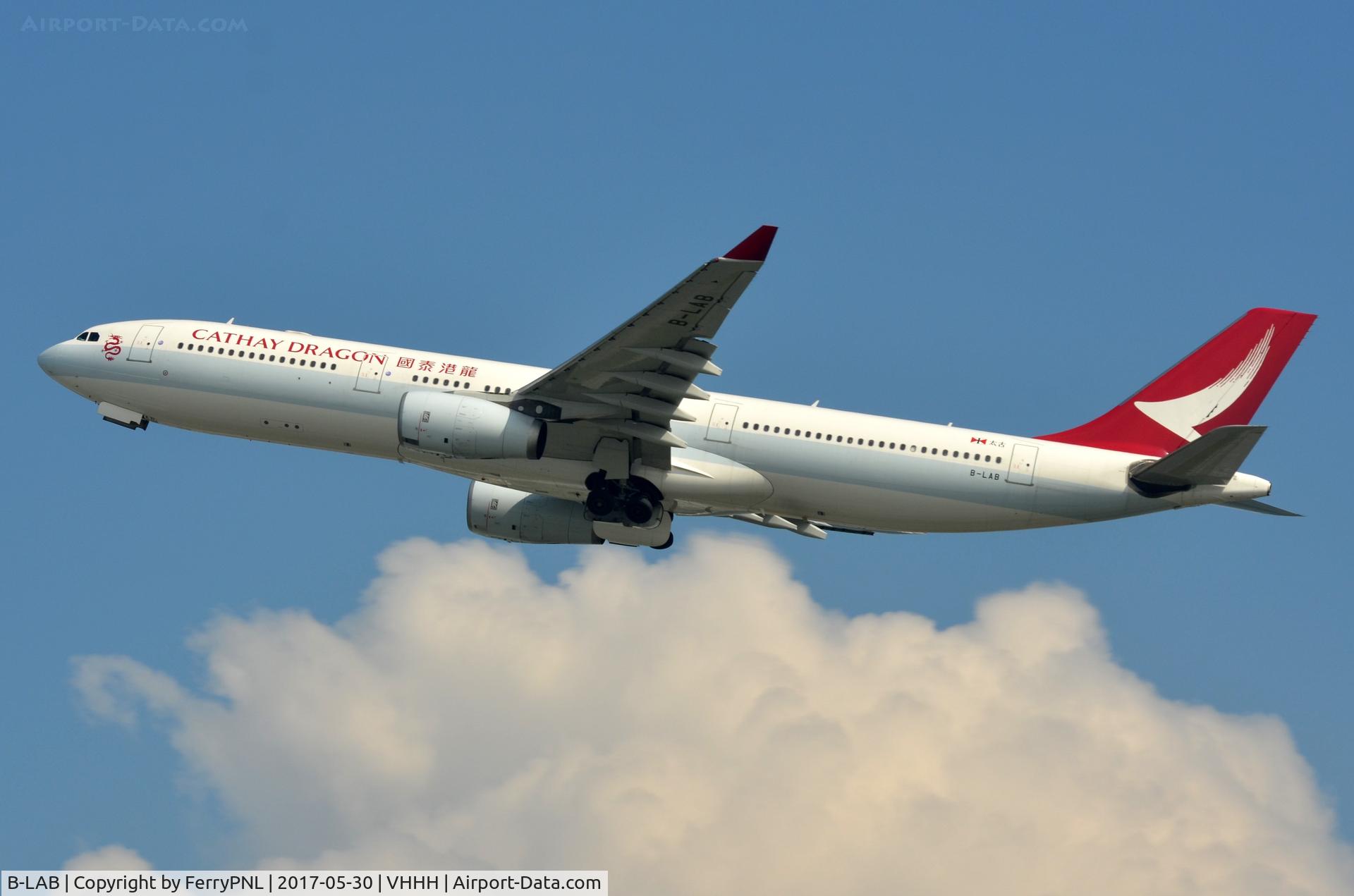 B-LAB, 2005 Airbus A330-343X C/N 673, Cathay Dragon A333 retracting its landing gear.