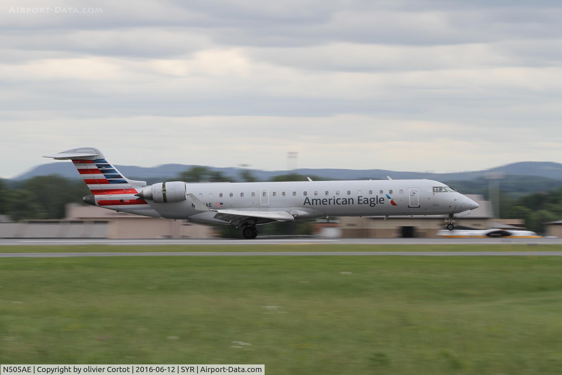 N505AE, 2002 Bombardier CRJ-701 (CL-600-2C10) Regional Jet C/N 10053, landing at Syracuse