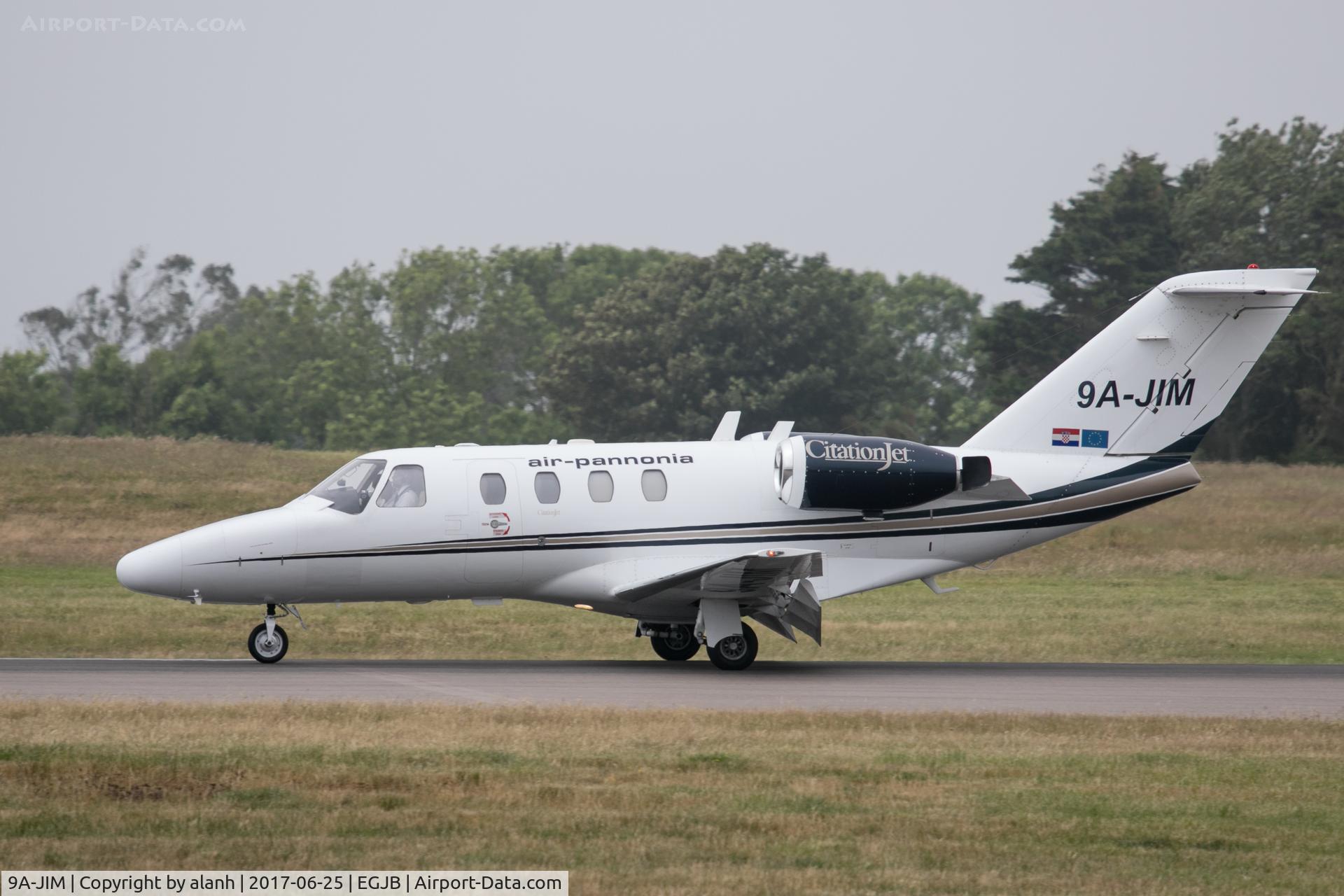 9A-JIM, 1998 Cessna 525 CitationJet CJ1 C/N 525-0277, Rolling out after arrival on 27 at Guernsey