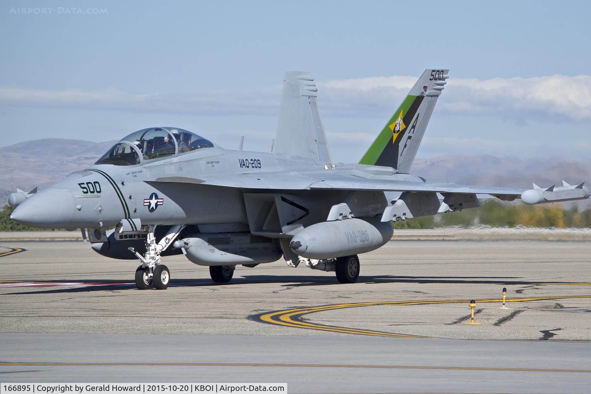 166895, Boeing EA-18G Growler C/N G-7, Turning into the south GA ramp.  VAQ-209 “Star Warriors”, NAS Whidbey Island, WA.