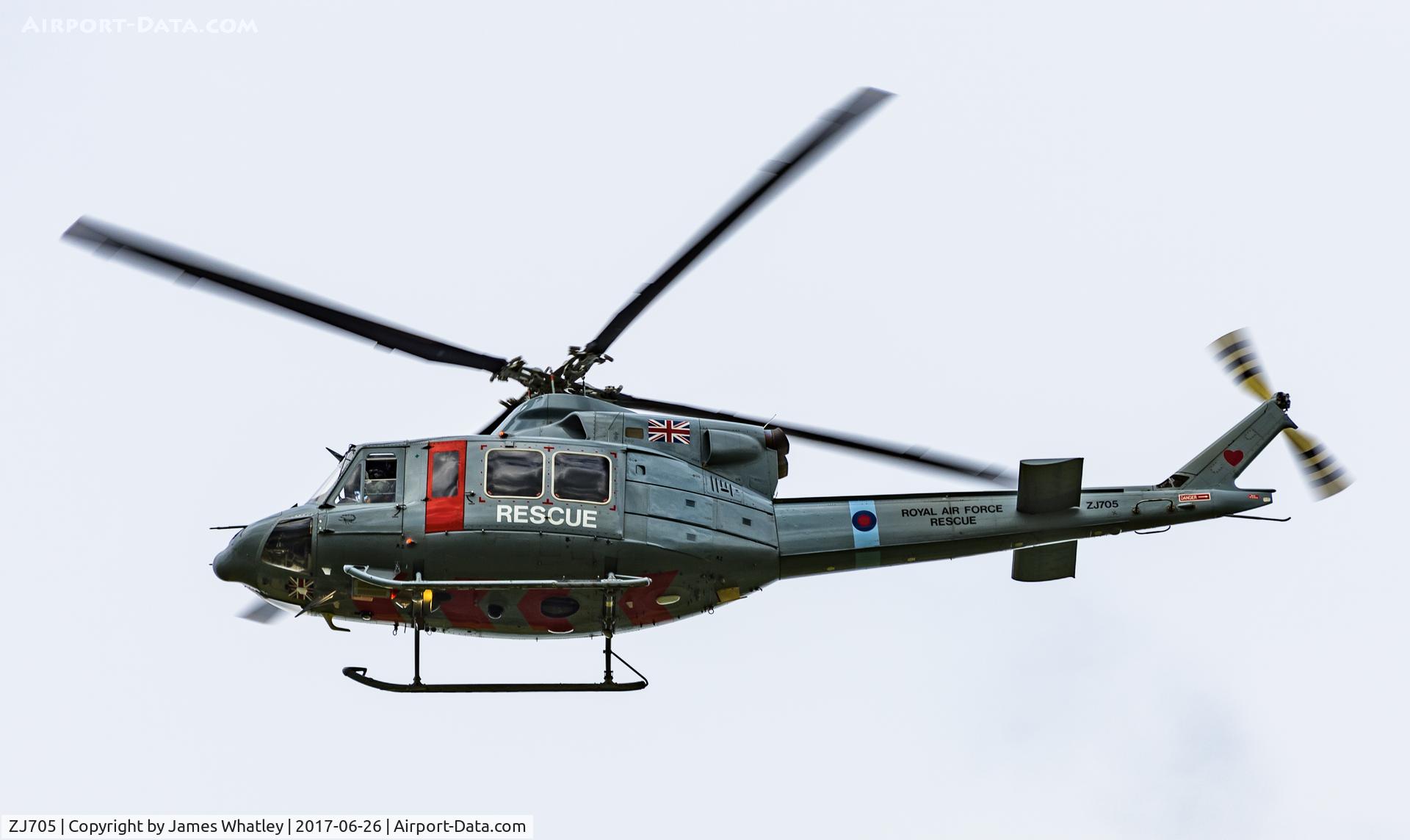 ZJ705, 2002 Bell 412EP Griffin HAR.2 C/N 36306, Flying low near Boscombe Down