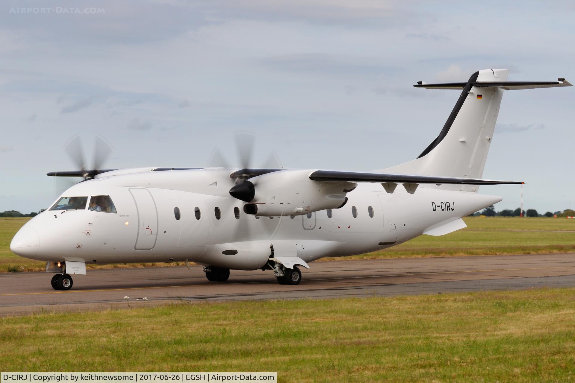 D-CIRJ, 1995 Dornier 328-100 C/N 3035, Leaving Norwich following re-spray.