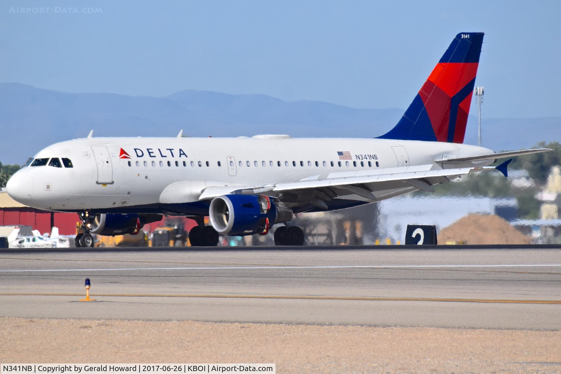 N341NB, 2002 Airbus A319-114 C/N 1738, Landing roll out on RWY 10L. Reverse thrusters out.
