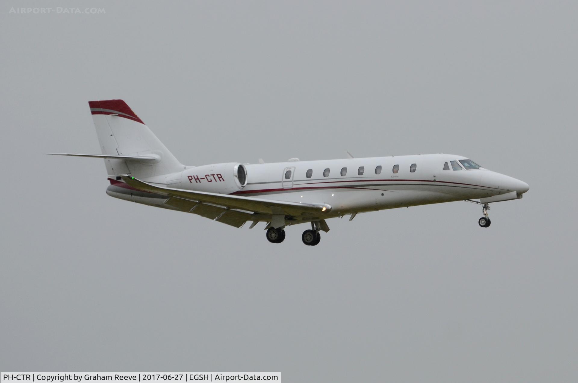 PH-CTR, 2014 Cessna 680 Citation Sovereign+ C/N 680-0525, Landing at Norwich in heavy rain.