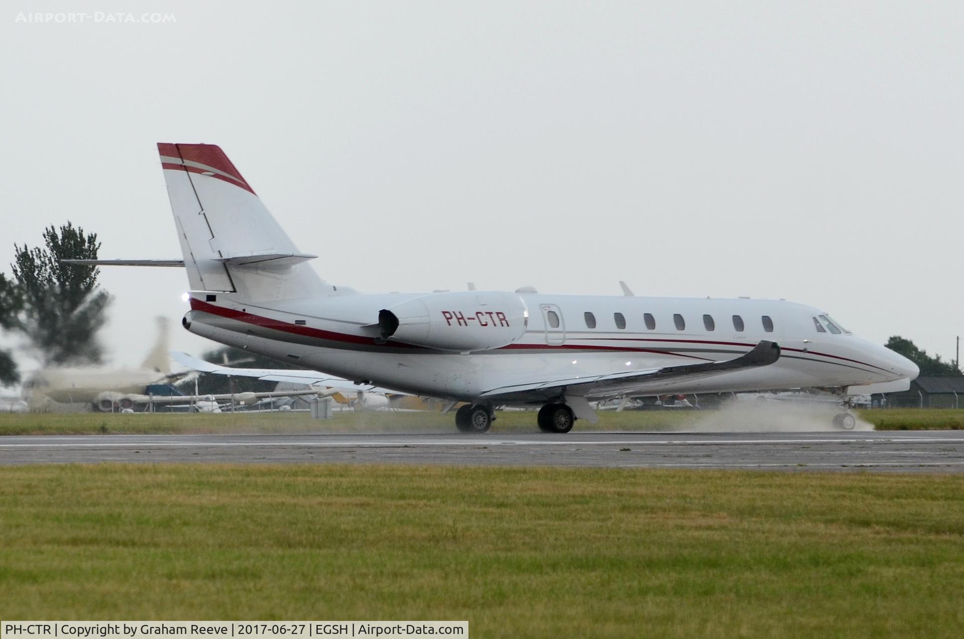 PH-CTR, 2014 Cessna 680 Citation Sovereign+ C/N 680-0525, Departing from Norwich in heavy rain.