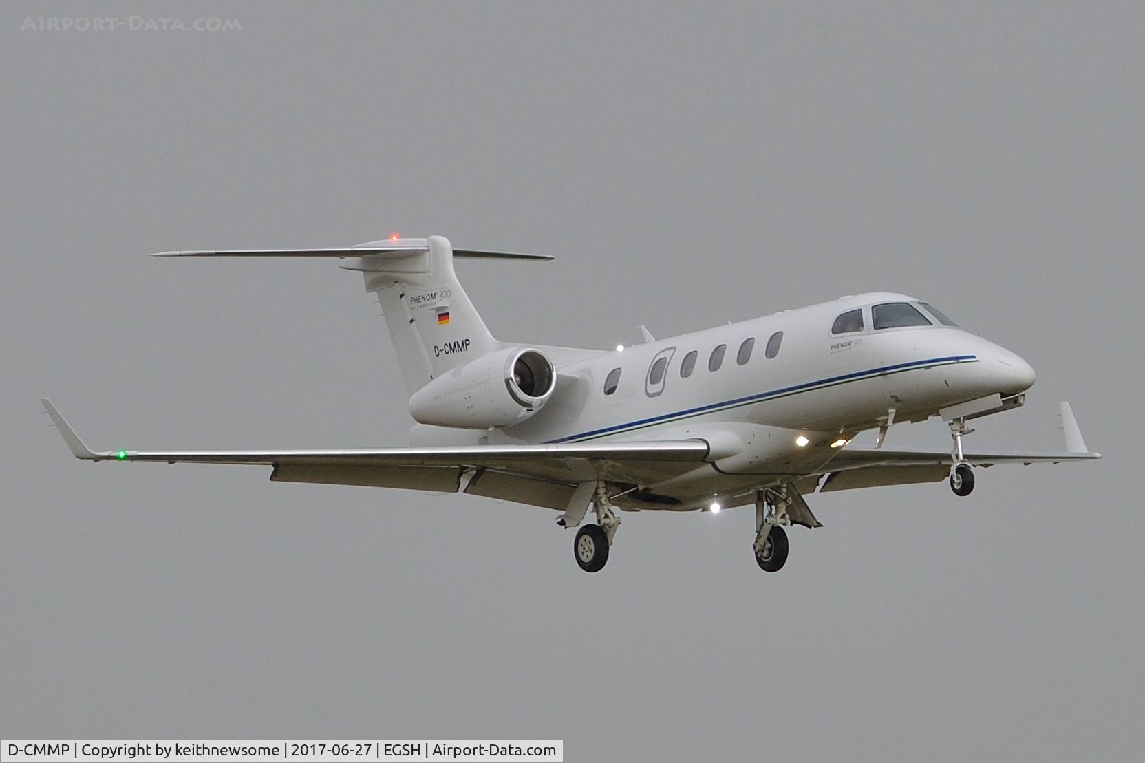 D-CMMP, 2016 Embraer EMB-505 Phenom 300 C/N 50500360, Arriving at Norwich in heavy rain.