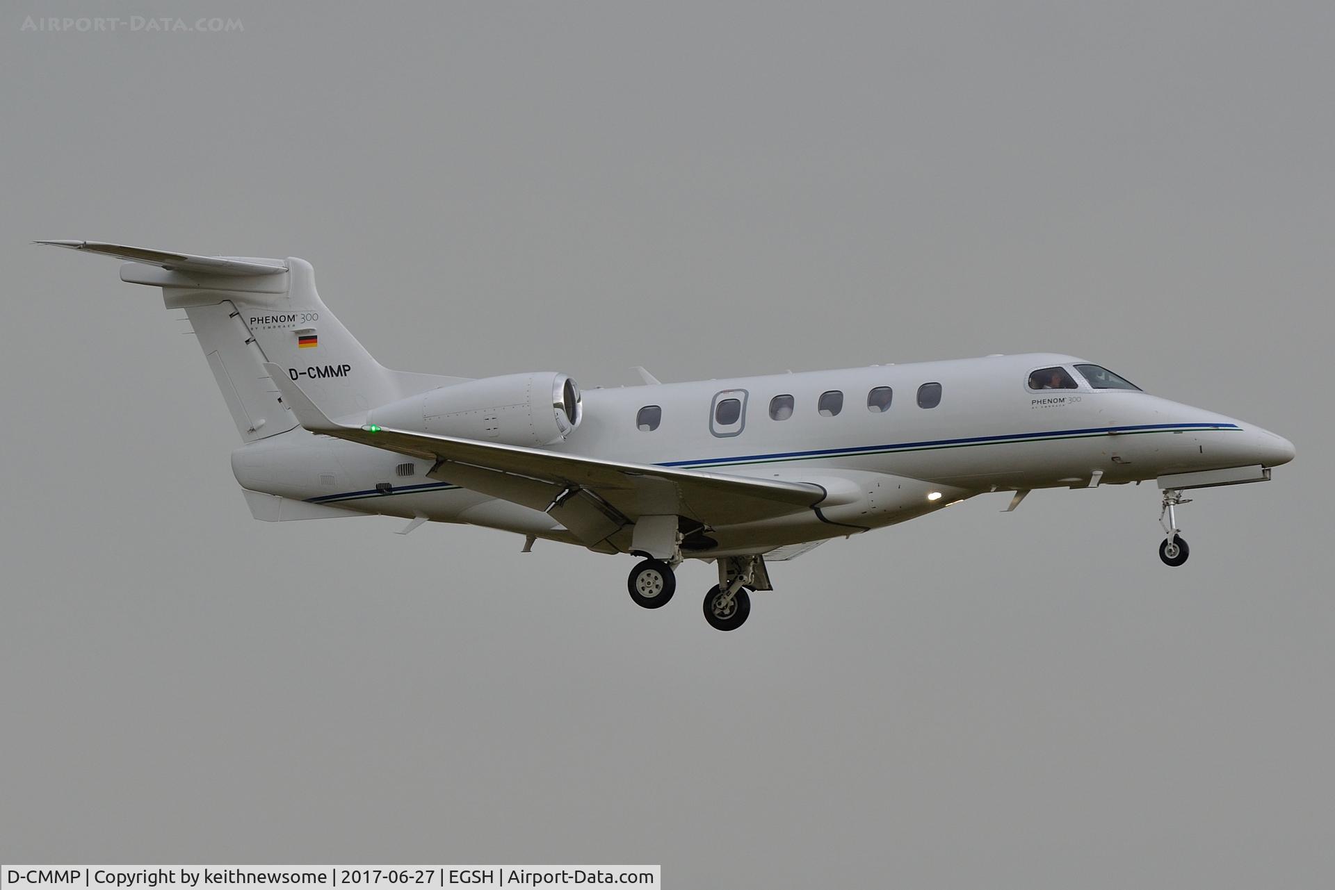 D-CMMP, 2016 Embraer EMB-505 Phenom 300 C/N 50500360, Arriving at Norwich in heavy rain.