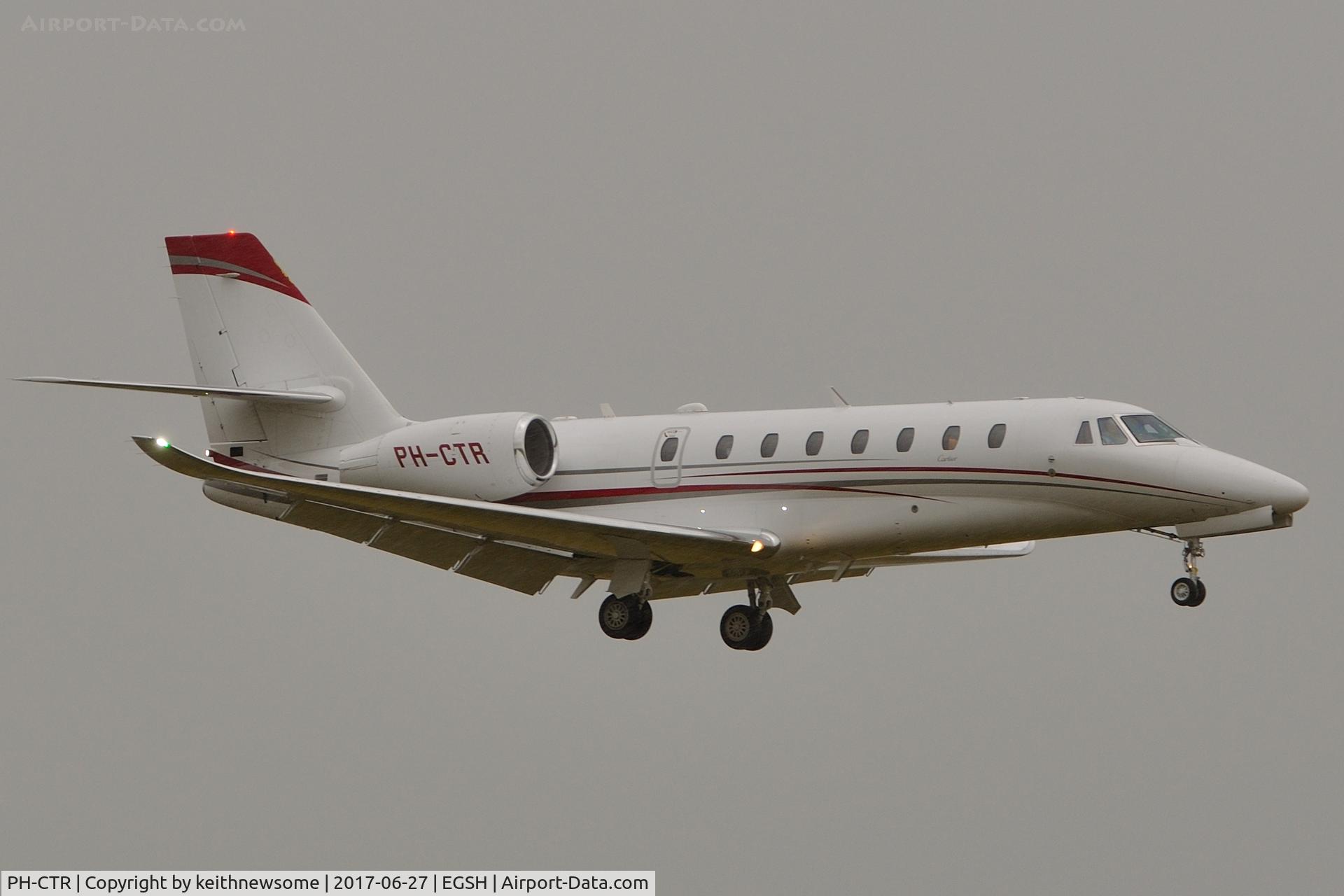 PH-CTR, 2014 Cessna 680 Citation Sovereign+ C/N 680-0525, Arriving at Norwich in heavy rain.