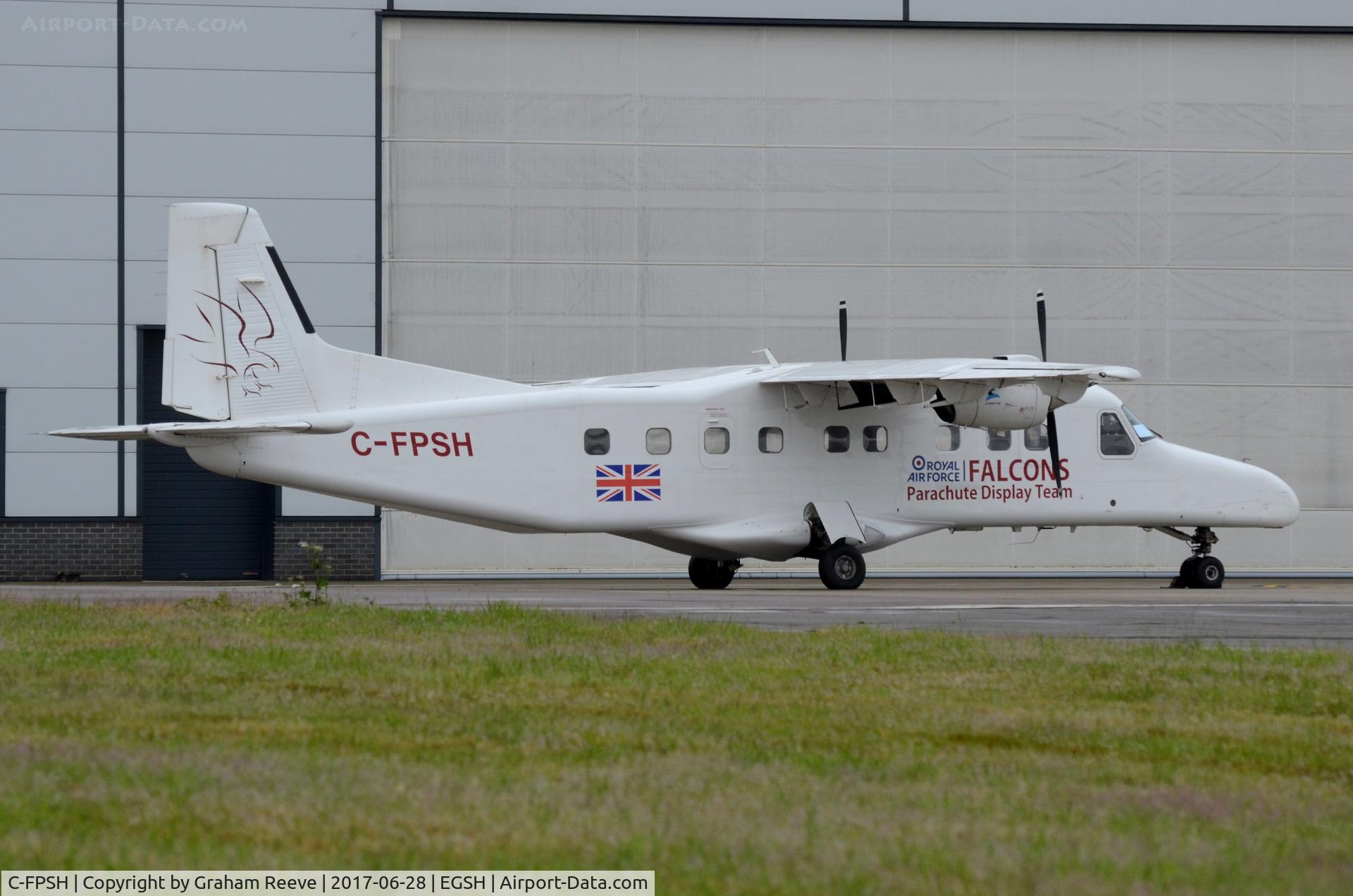 C-FPSH, 1986 Dornier 228-202 C/N 8071, Royal Air Force Falcons parachute display team's aircraft parked at Norwich.
