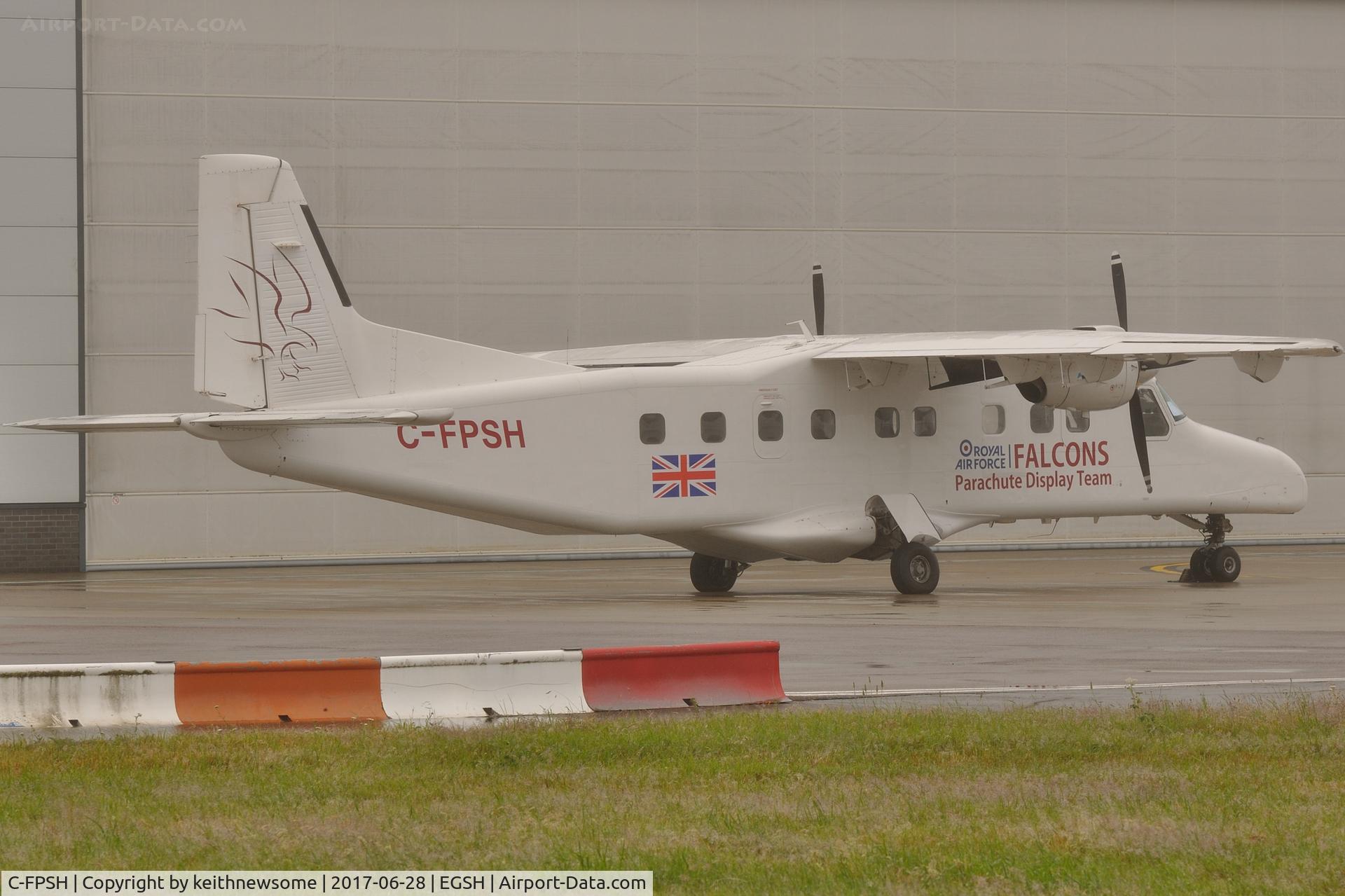C-FPSH, 1986 Dornier 228-202 C/N 8071, Awaiting improved weather conditions for parachute drops at Royal Norfolk Show.