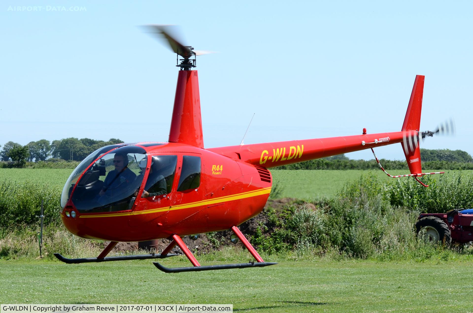 G-WLDN, 2005 Robinson R44 Raven 1 C/N 1507, Departing from Northrepps.
