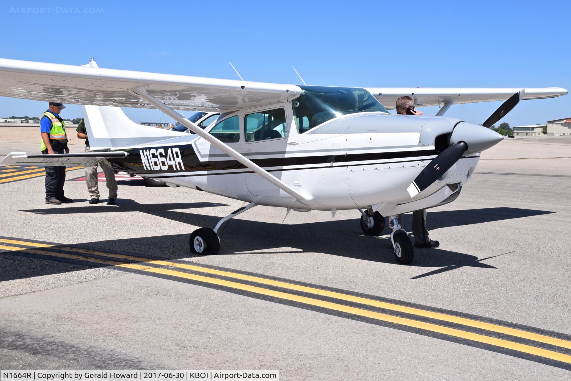 N1664R, 1978 Cessna R182 Skylane RG C/N R18200503, Landed RWY 10L and had a flat tire. Managed to taxi to Taxiway Golf. Montana State Police aircraft.