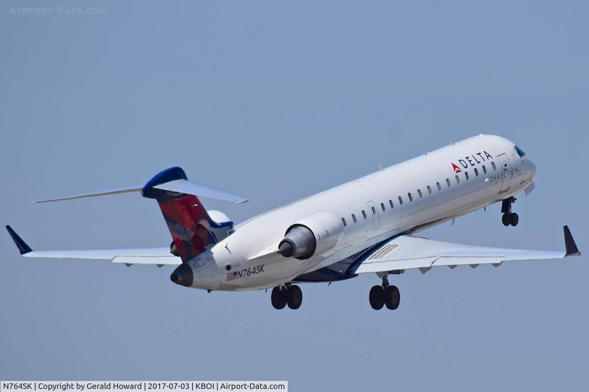 N764SK, 2005 Canadair CRJ-700 (CL-600-2C10) Regional Jet C/N 10229, Departing BOI.