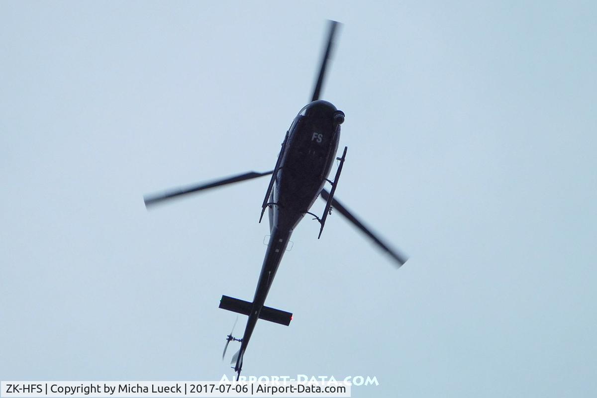 ZK-HFS, 1988 Eurocopter AS-355F-2 Ecureuil 2 C/N 5388, Over Auckland CBD, filming the America's Cup Parade