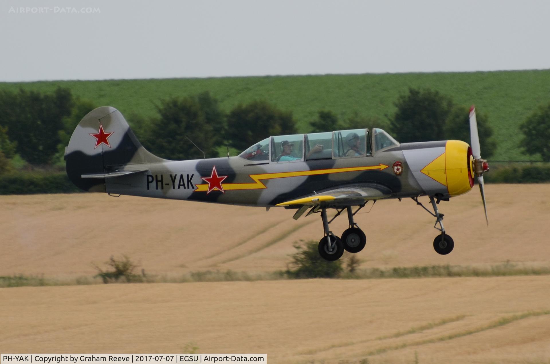 PH-YAK, 1987 Bacau Yak-52 C/N 877401, Landing at Duxford.