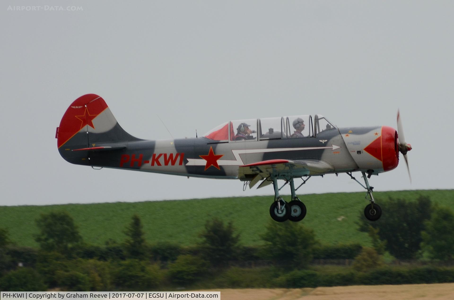 PH-KWI, 1989 Bacau Yak-52 C/N 899714, Landing at Duxford.