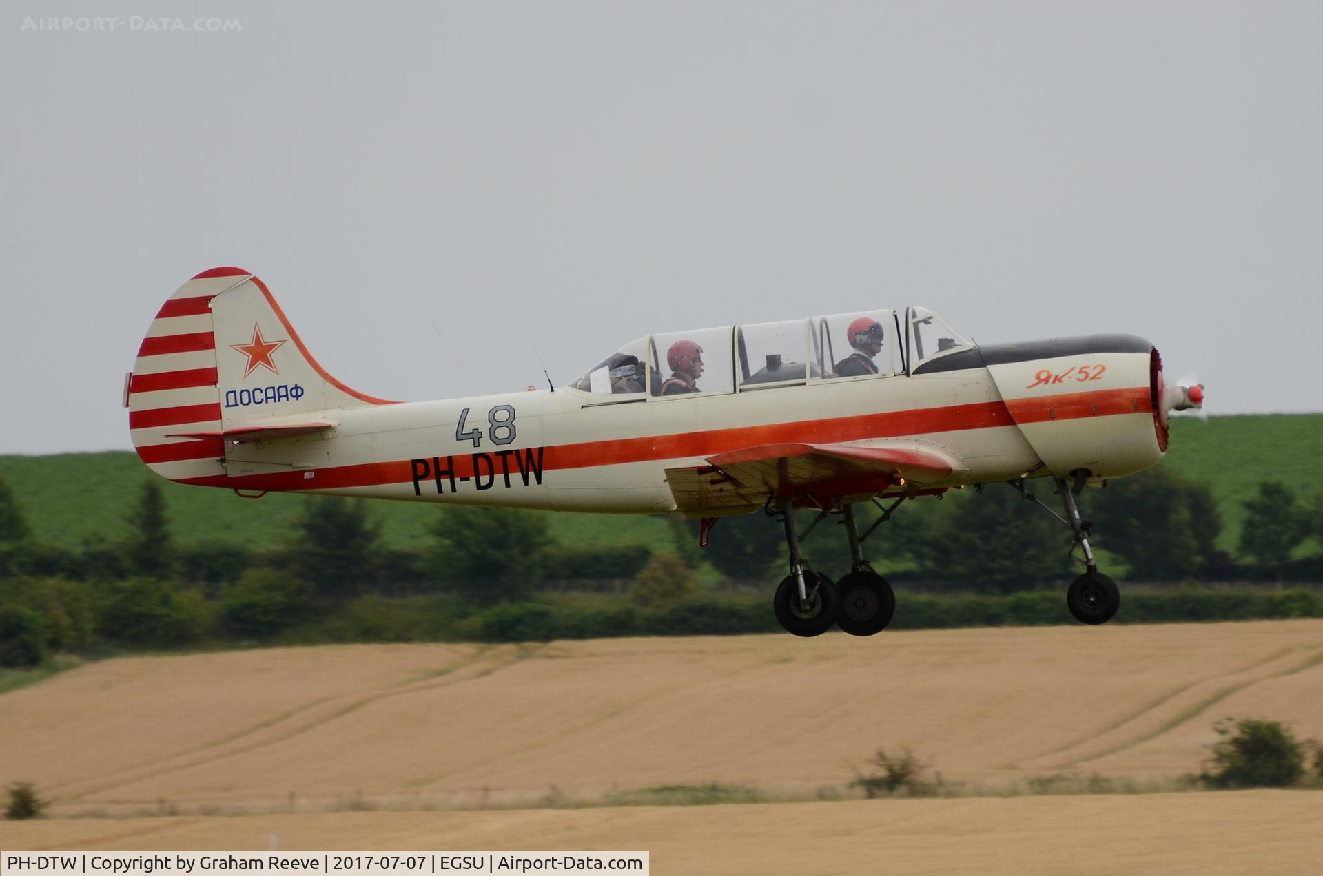 PH-DTW, 1991 Yakovlev (Aerostar) Yak-52 C/N 9111413, Landing at Duxford.