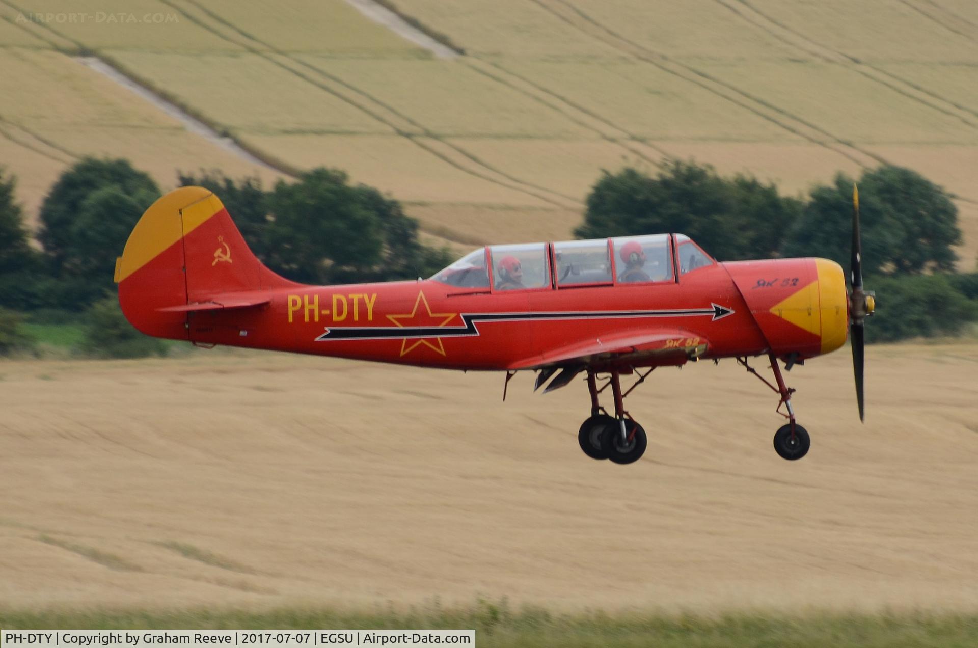 PH-DTY, 1986 Bacau Yak-52 C/N 866811, Landing at Duxford.