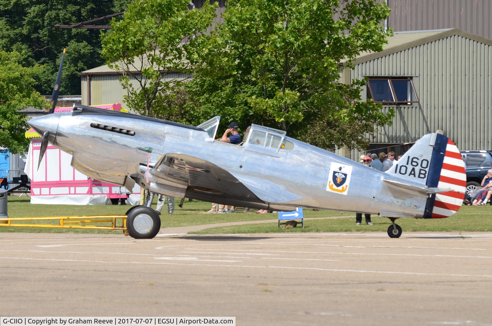 G-CIIO, 1941 Curtiss P-40C Warhawk C/N 16161, Under tow at Duxford.