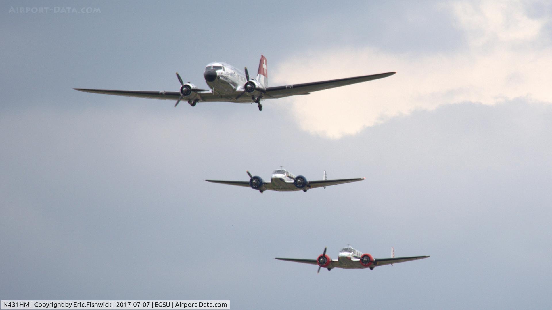 N431HM, 1943 Douglas DC-3C-S1C3G (C-47A) C/N 9995, 45. The Dakota in formation with the pair of Beechcraft Model 18's on the eve of The Flying Legends Airshow, July 2017.