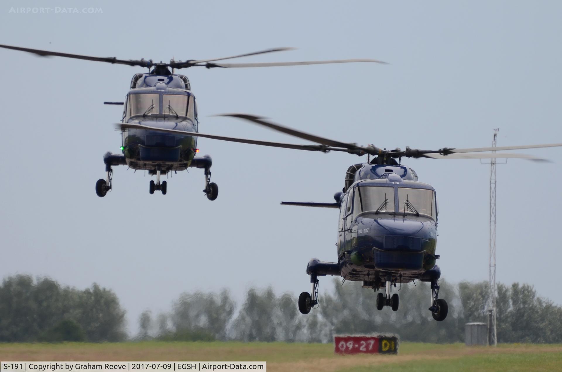 S-191, 1980 Westland Super Lynx Mk.90B C/N 409, S-134 and S-191 landing at Norwich.