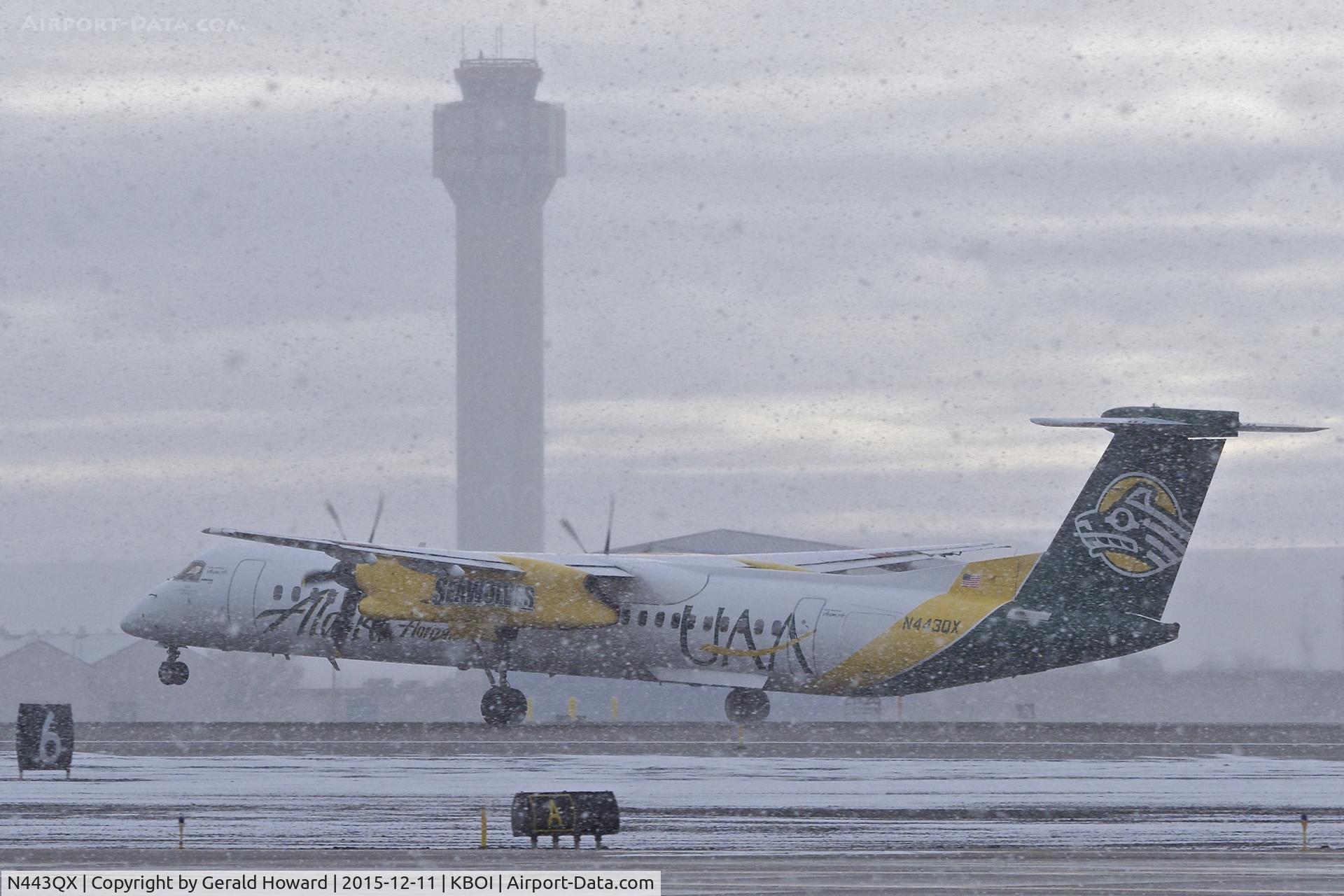 N443QX, 2010 Bombardier DHC-8-402 Dash 8 C/N 4353, Departing RWY 10L at the start of the snow storm.