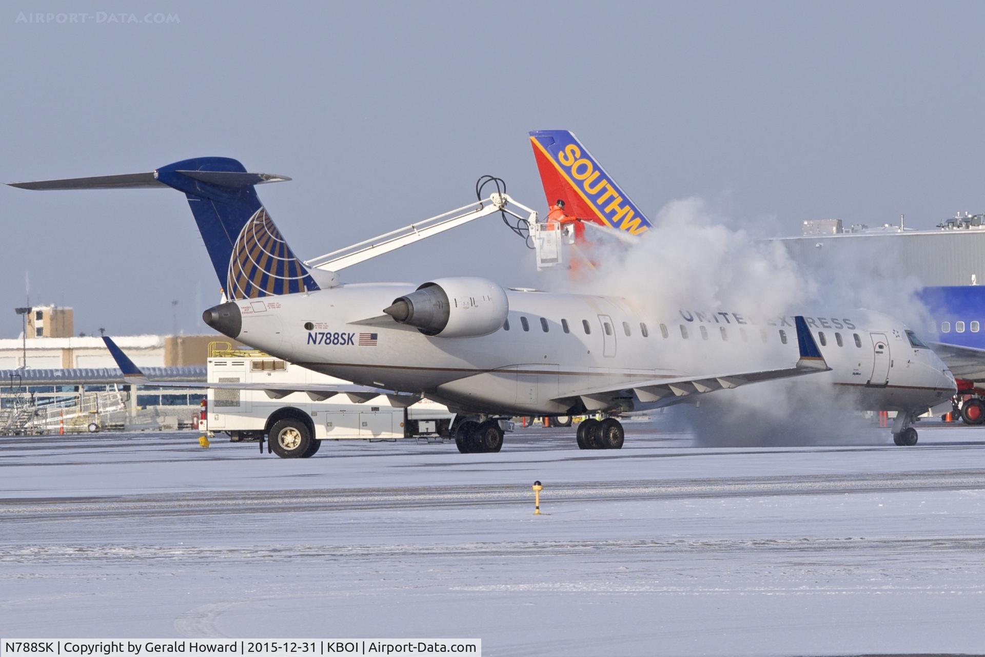N788SK, 2009 Bombardier CRJ-700 (CL-600-2C10) Regional Jet C/N 10290, De ice on the ramp.