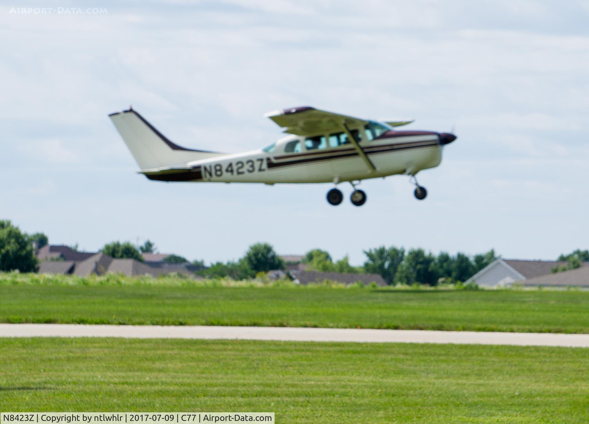 N8423Z, 1963 Cessna 210-5(205) C/N 205-0423, Taking off at the EAA Poplar Grove Pancake Breakfast Fly In.