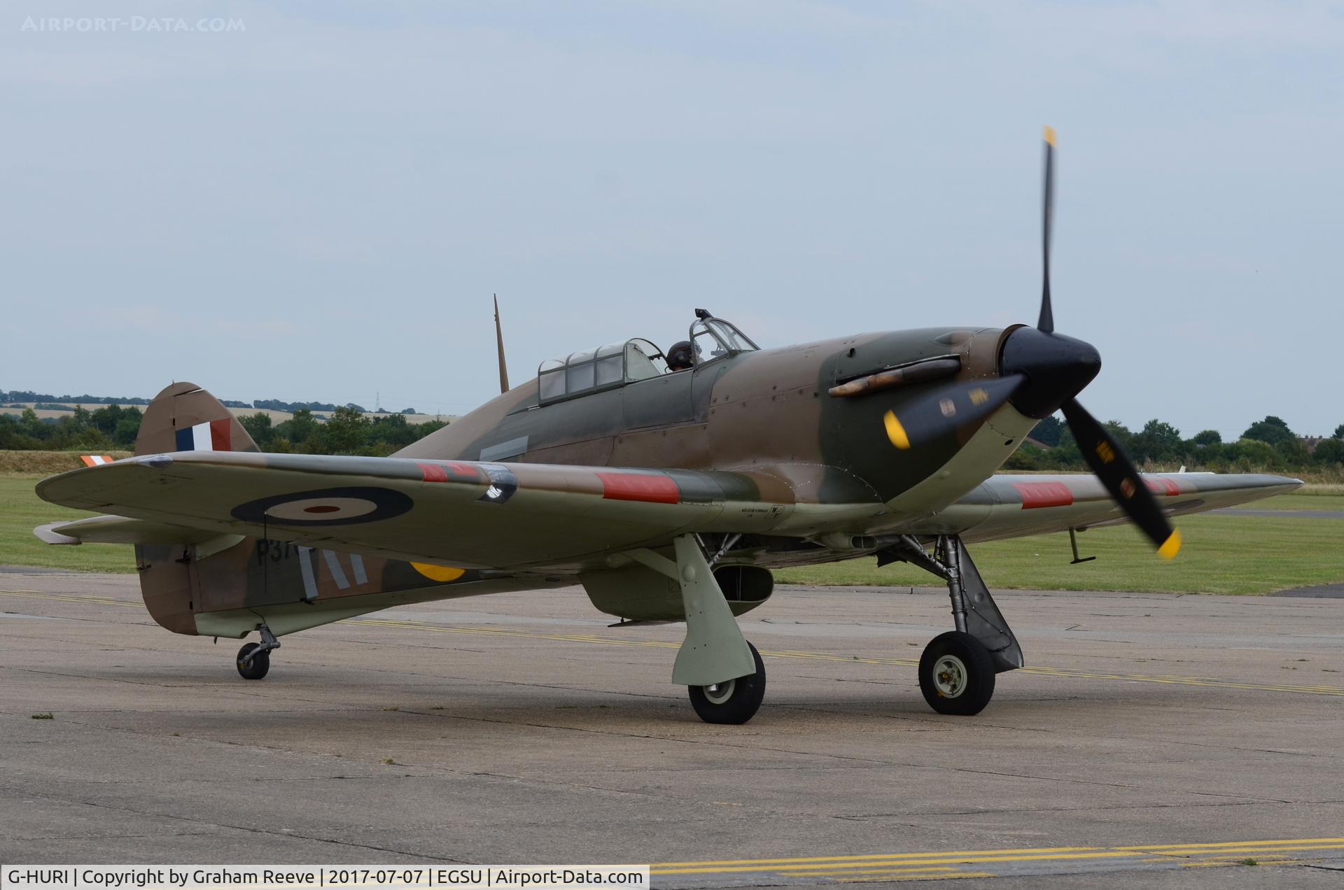 G-HURI, 1942 Hawker (CCF) Hurricane Mk12A C/N 72036, About to depart.