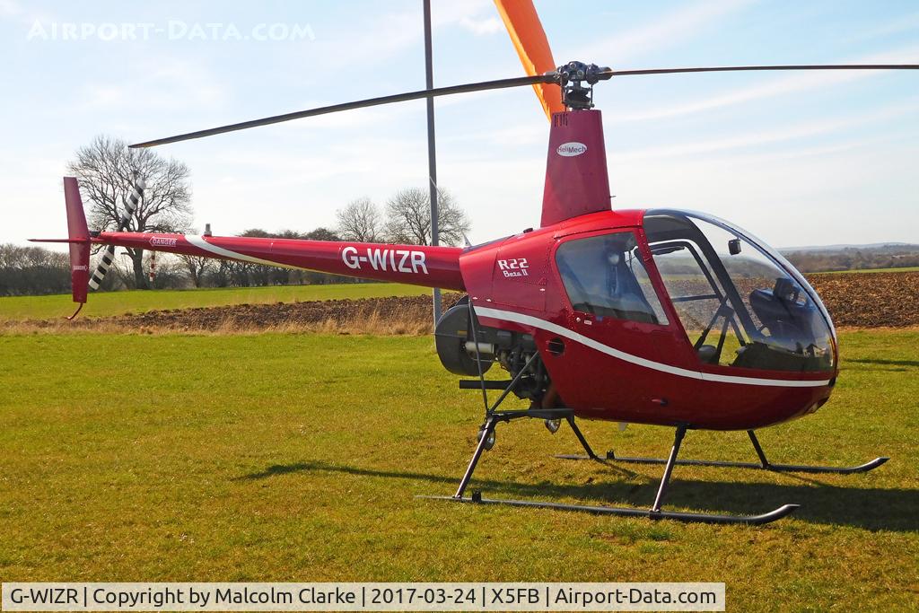 G-WIZR, 1998 Robinson R22 Beta II C/N 2799, Robinson R22 Beta II at Fishburn Airfield UK. March 24th 2017.