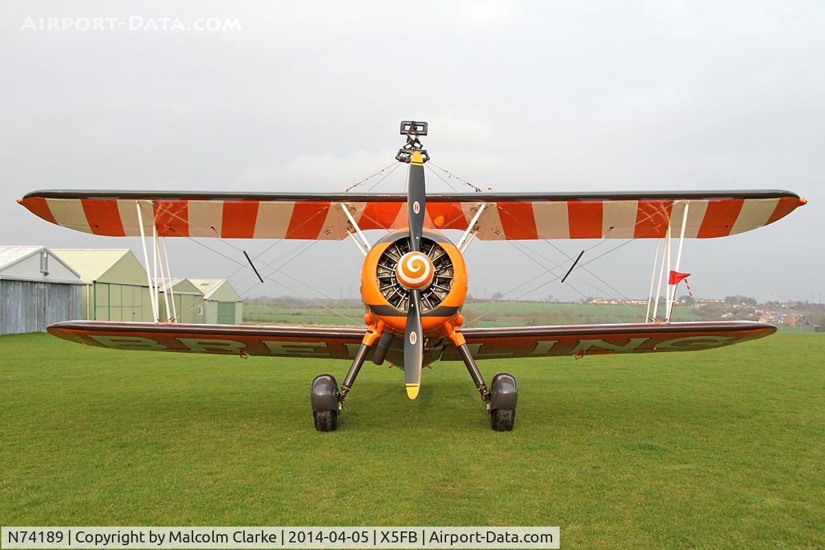 N74189, 1941 Boeing PT-17/R985 Kaydet (A75N1) C/N 75-717, Boeing PT-17 overnighting at Fishburn Airfield prior to a first UK performance in 2014 at Littlehaven's Promenade & Seawall opening celebrations, South Shields. April 5th 2014.
