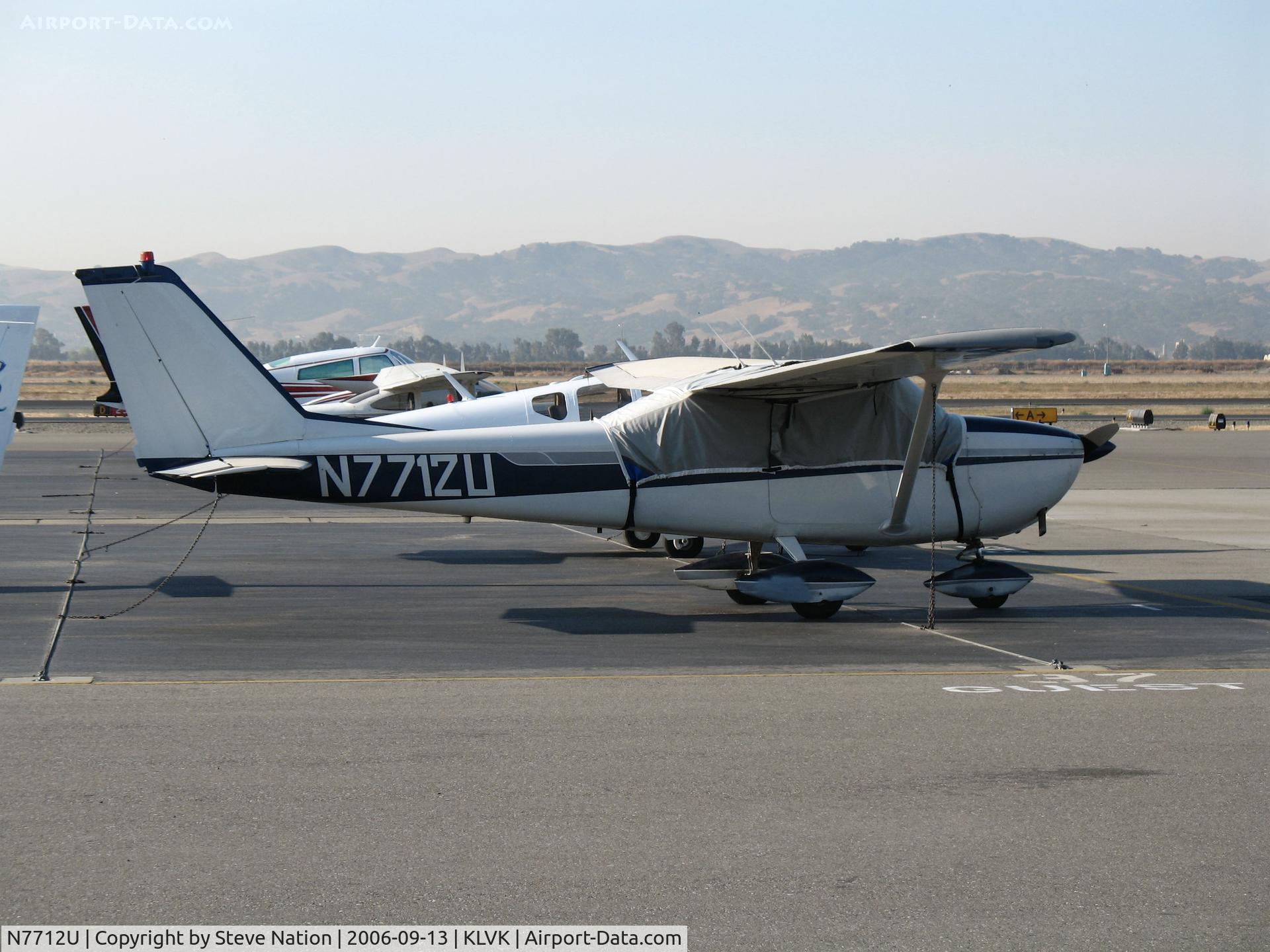 N7712U, 1964 Cessna 172E C/N 17251712, 1964 Cessna 172E on visitor's ramp @ Livermore, CA