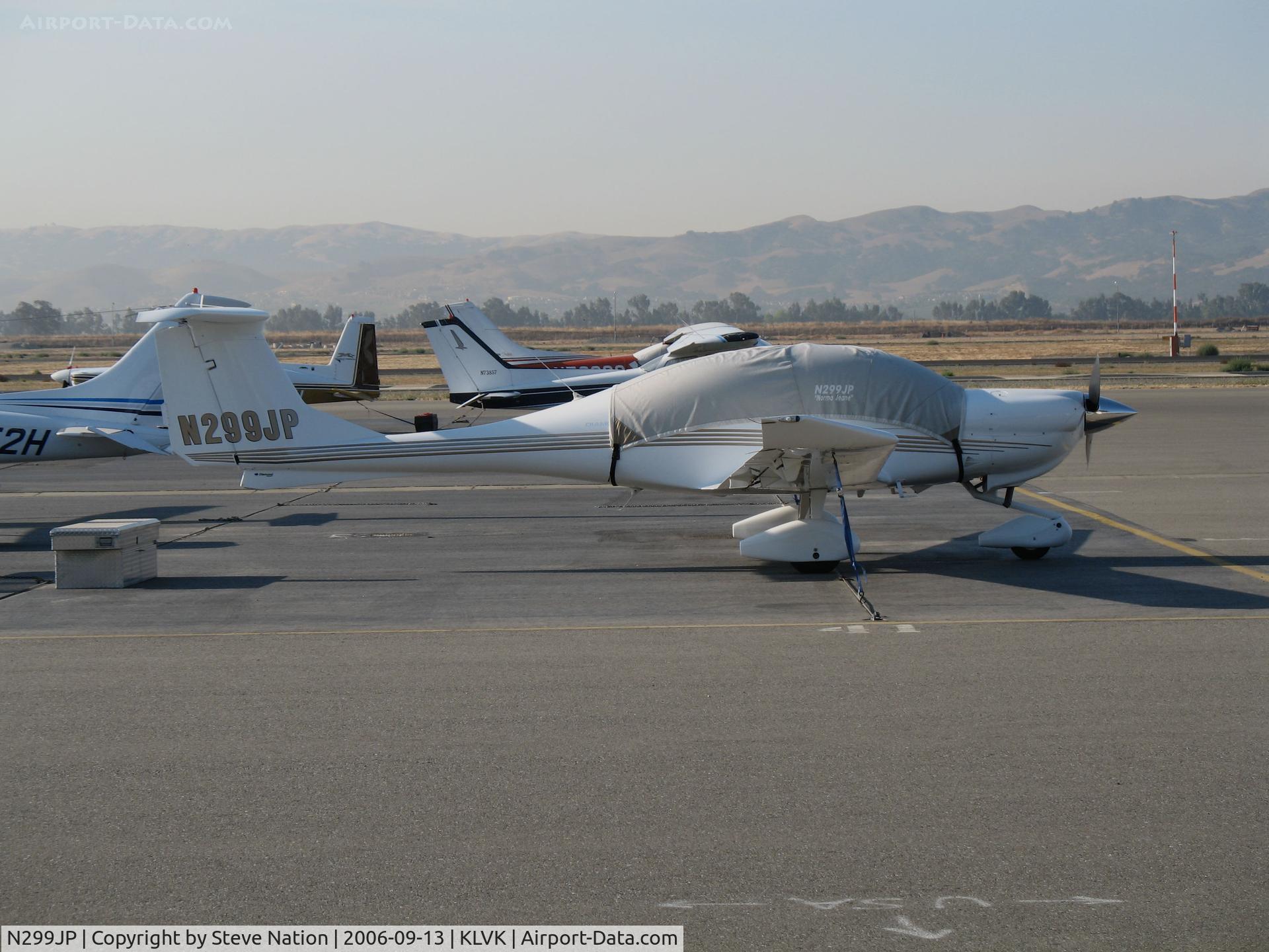 N299JP, 2003 Diamond DA-40 Diamond Star C/N 40.329, Locally-based 2003 Diamond DA-40 with cockpit cover @ Livermore, CA