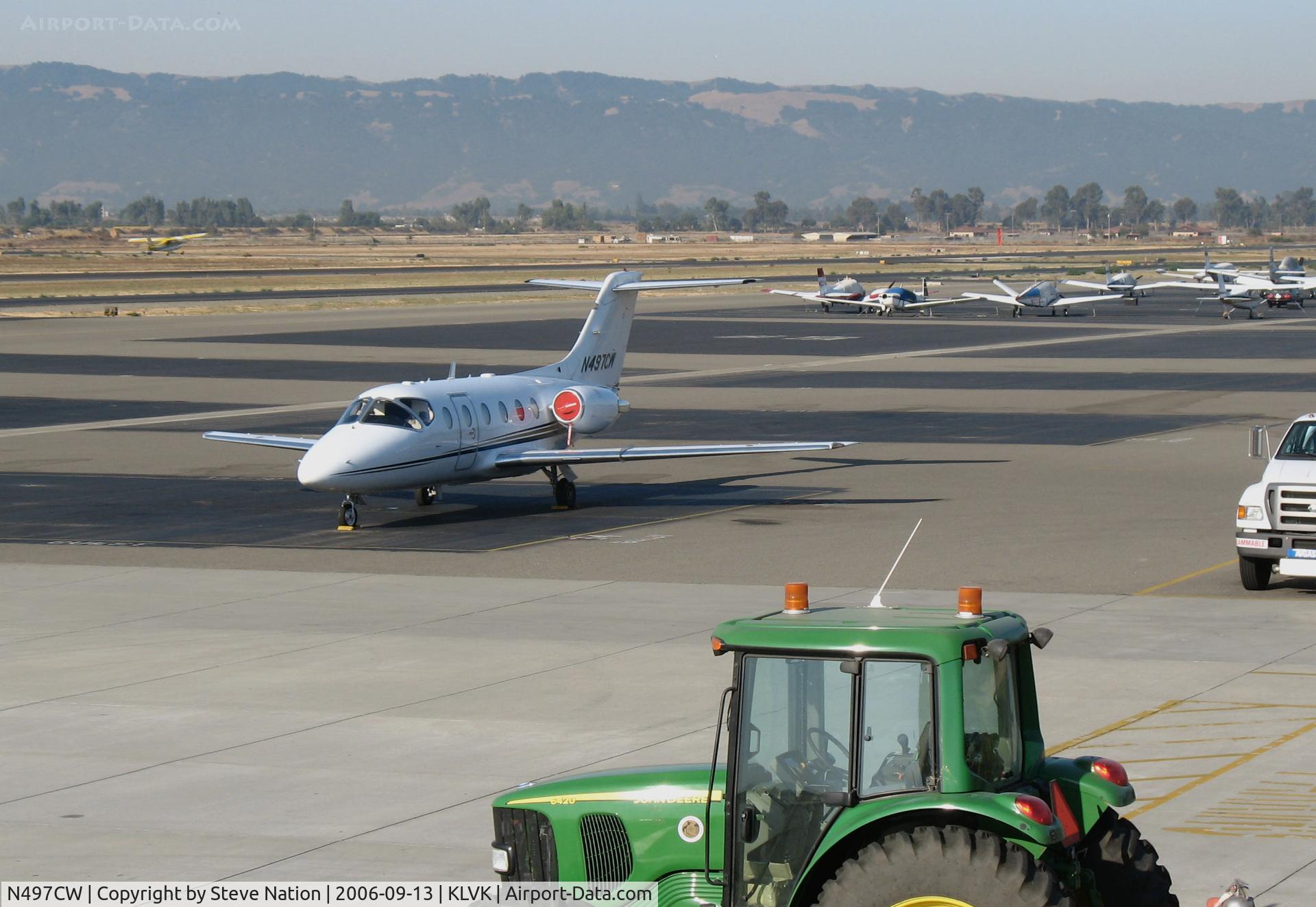 N497CW, 2000 Raytheon Aircraft Company 400A C/N RK-297, 2000 Raytheon 400A in front of general aviation terminal @ Livermore, CA (now N497RC with Redi-Carpet Properties LLC, Stafford, TX)