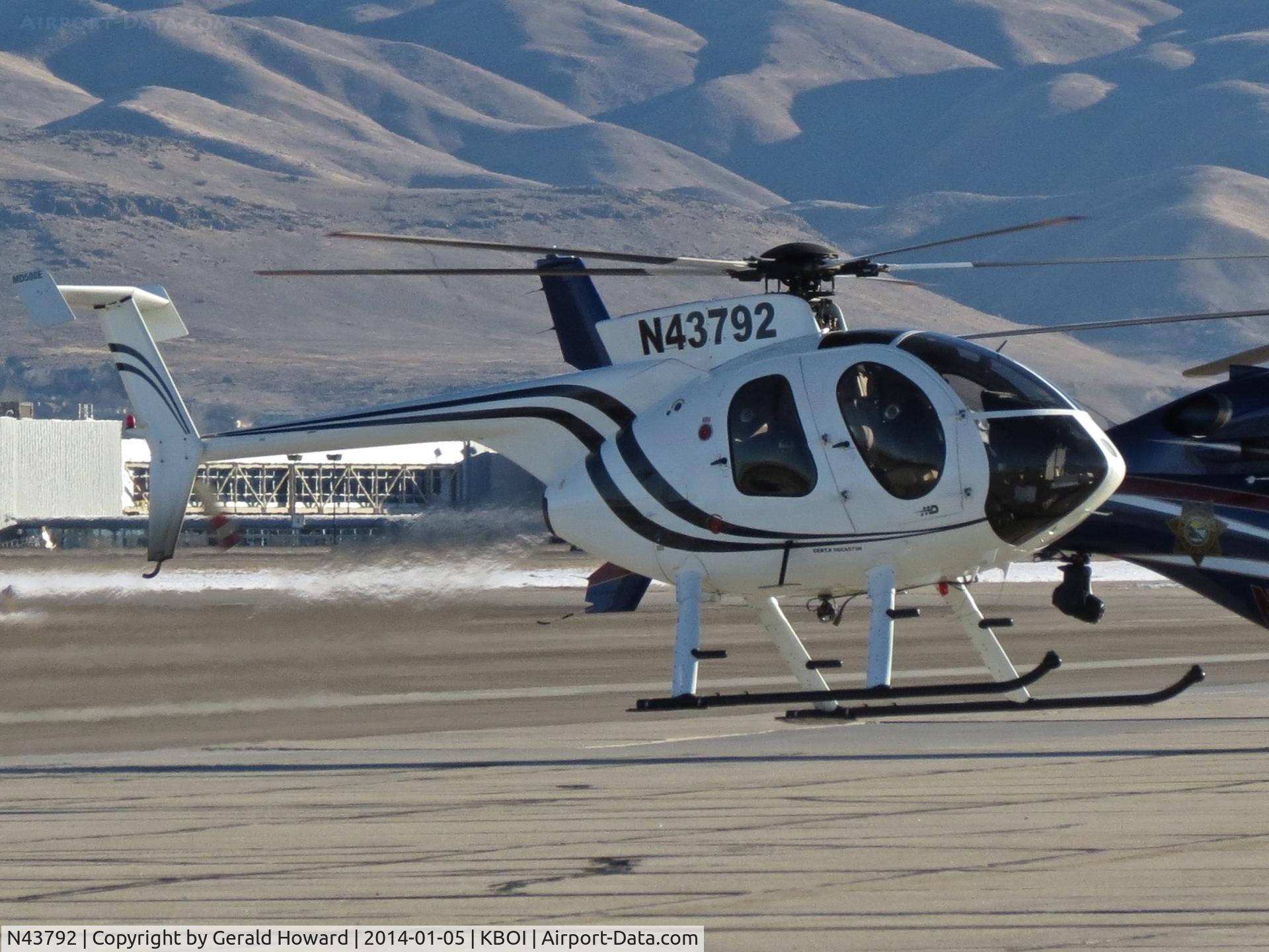 N43792, MD Helicopters 369E C/N 0601E, Just lifting off from the south GA ramp. (I clicked on the MD helo)