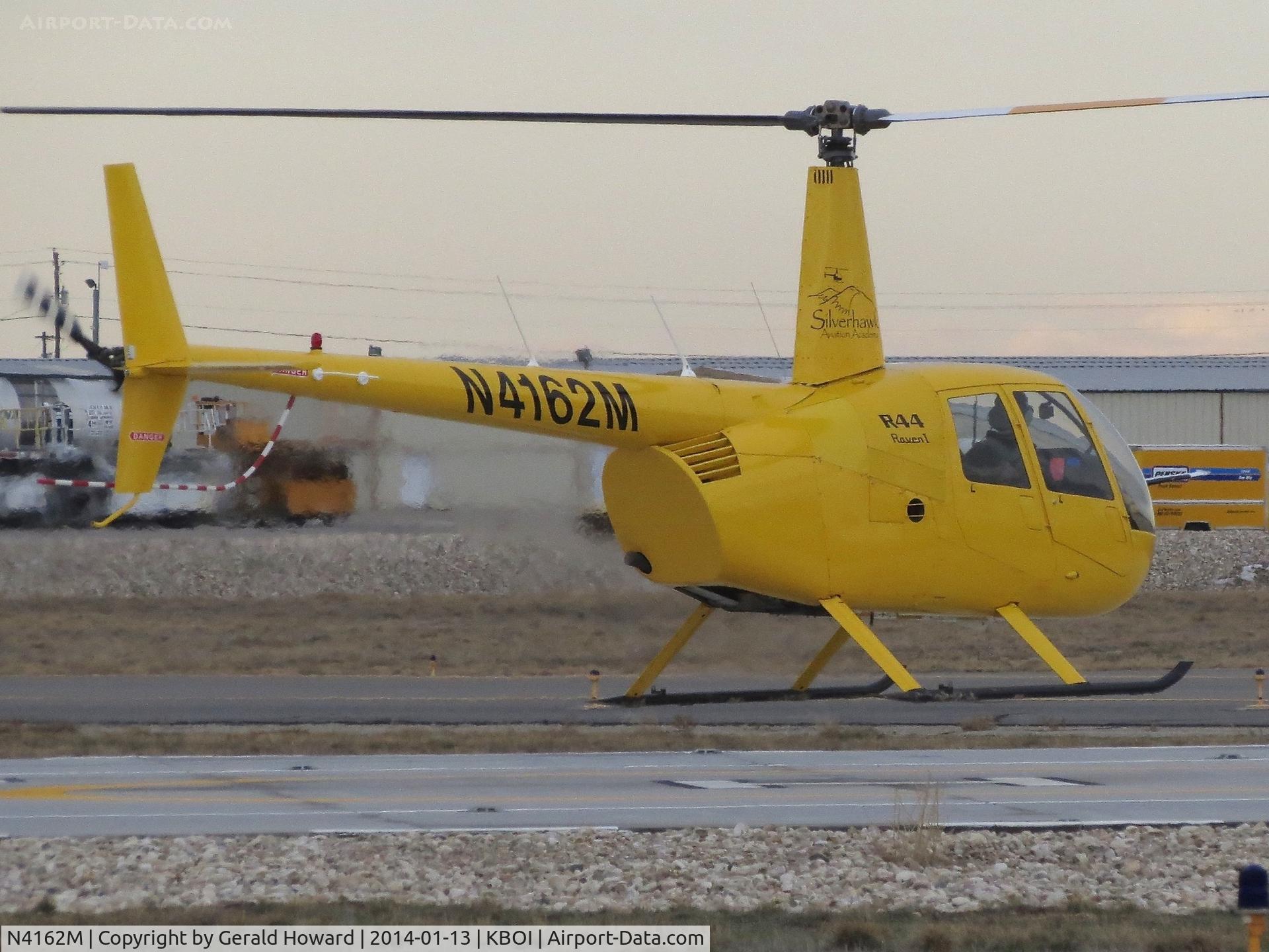 N4162M, 2008 Robinson R44 C/N 1877, Hovering on the south helicopter pad.