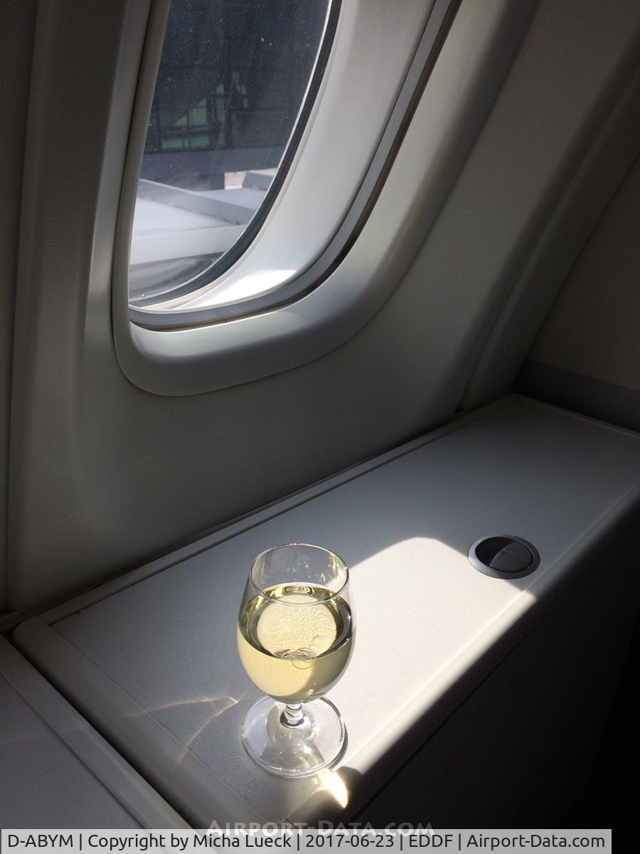 D-ABYM, 2014 Boeing 747-830 C/N 37837, Pre-take-off drink. I love the extra storage on the upper deck of the B747 and A380