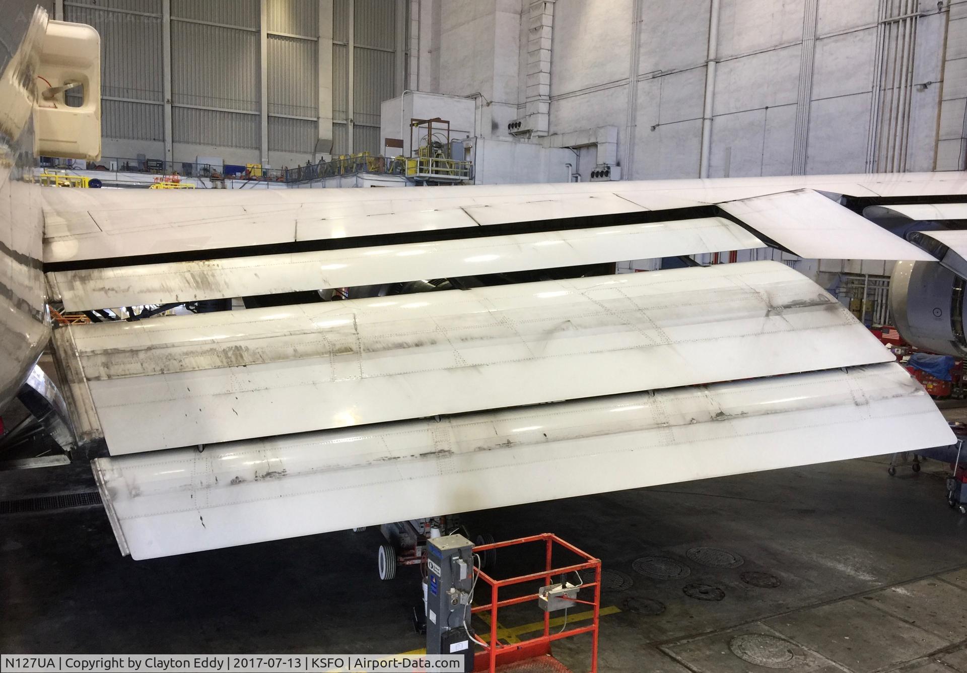 N127UA, 1999 Boeing 747-422 C/N 28813, Inboard wing flaps. SFO. 2017.