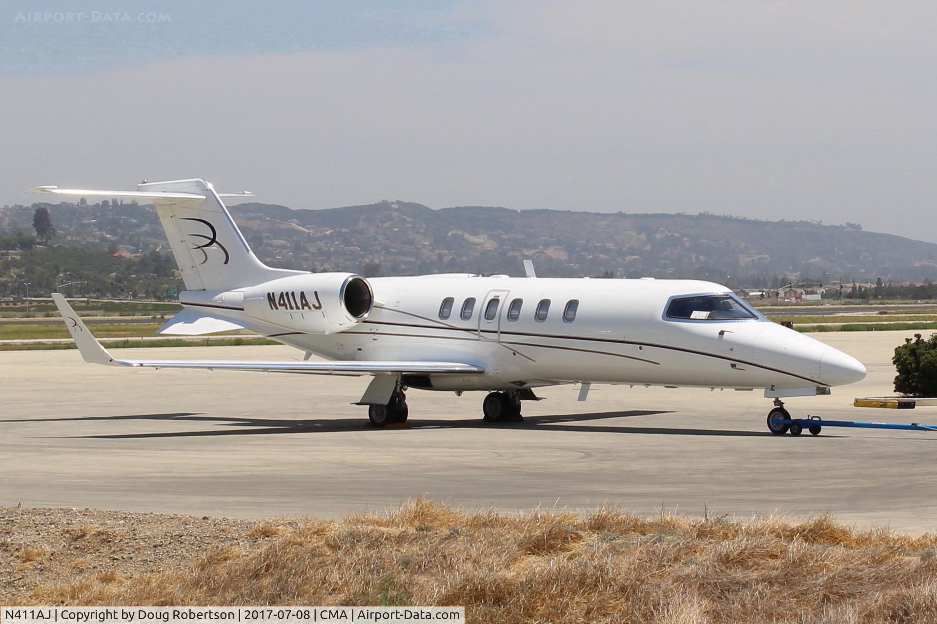 N411AJ, 2004 Learjet 40 C/N 40-2011, 2004 Bombardier Aerospace Learjet 45, 2 Honeywell TFE731-20-1B turbofans each flat rated at 3,500 lb st, with FADEC, T-tail, winglets. On SUN AIR ramp. All data from my 2003-2004 Jane's All The World's Aircraft. Please correct aircraft builder. 