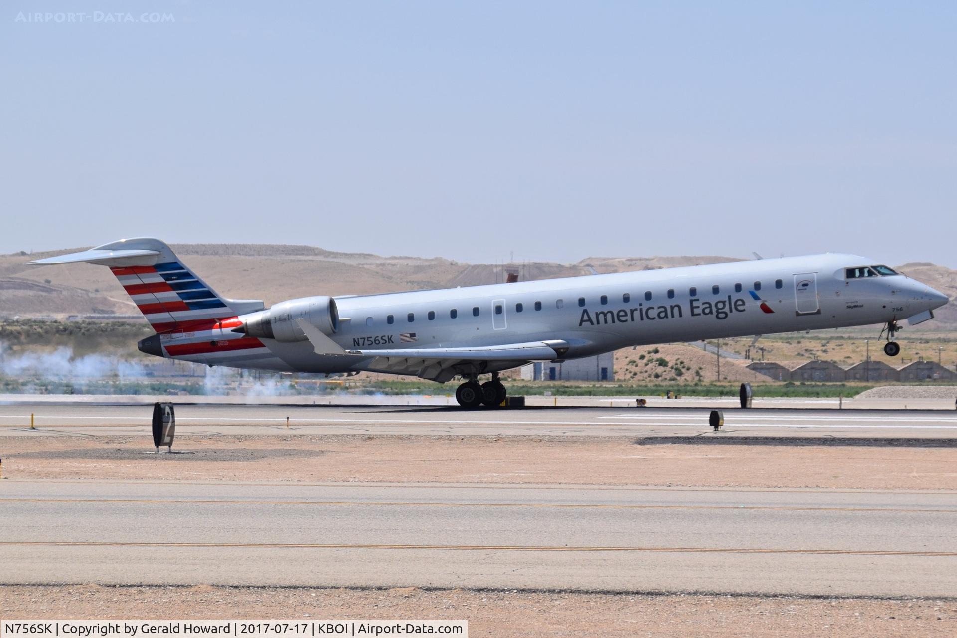 N756SK, 2005 Bombardier CRJ-701ER (CL-600-2C10) Regional Jet C/N 10221, Touching down on RWY 28R.