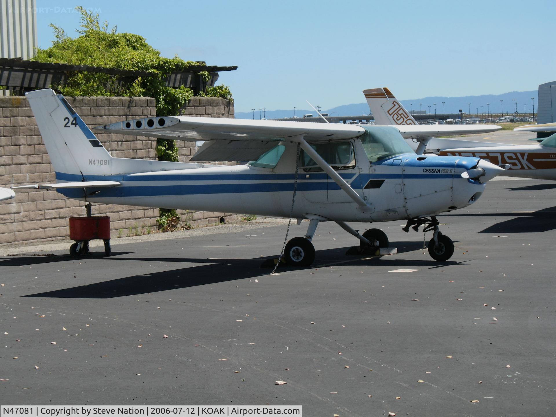 N47081, 1979 Cessna 152 C/N 15283168, Locally-based 1979 Cessna 152 minus wing tip on North ram p@ Oakland international Airport, CA