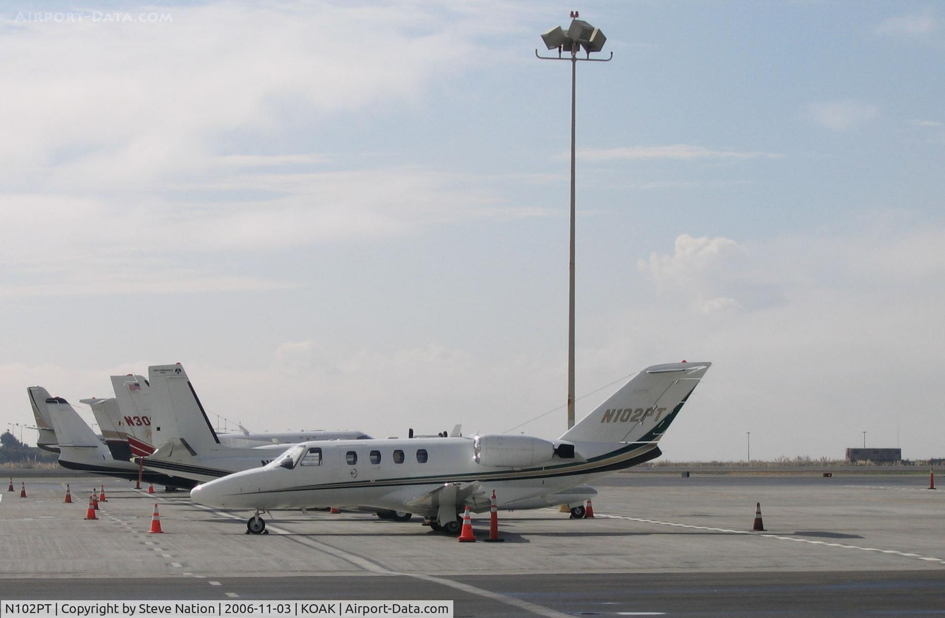N102PT, 2001 Cessna 525 CitationJet CJ1 C/N 525-0433, 2001 Cessna 525 on North ramp @ Oakland, CA in November 2006 (this aircraft crashed 2008-02-01 in West Gardiner, ME and destroyed)