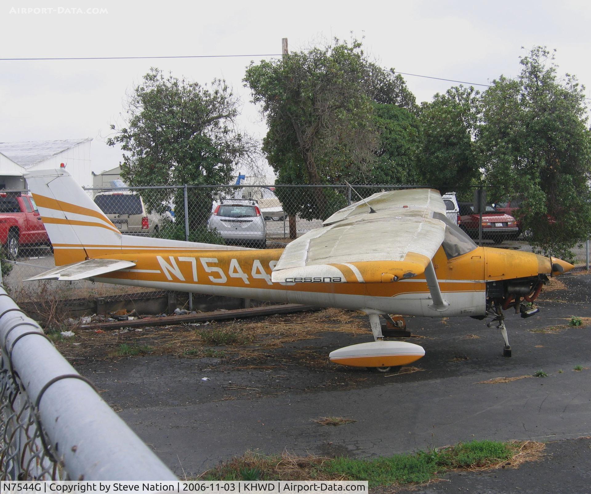N7544G, 1973 Cessna 150L C/N 15074697, Locally-based 1973 Cessna 150L a little worse for what @ Hayward Executive Airport, CA (now with owner in Los Banos, CA)