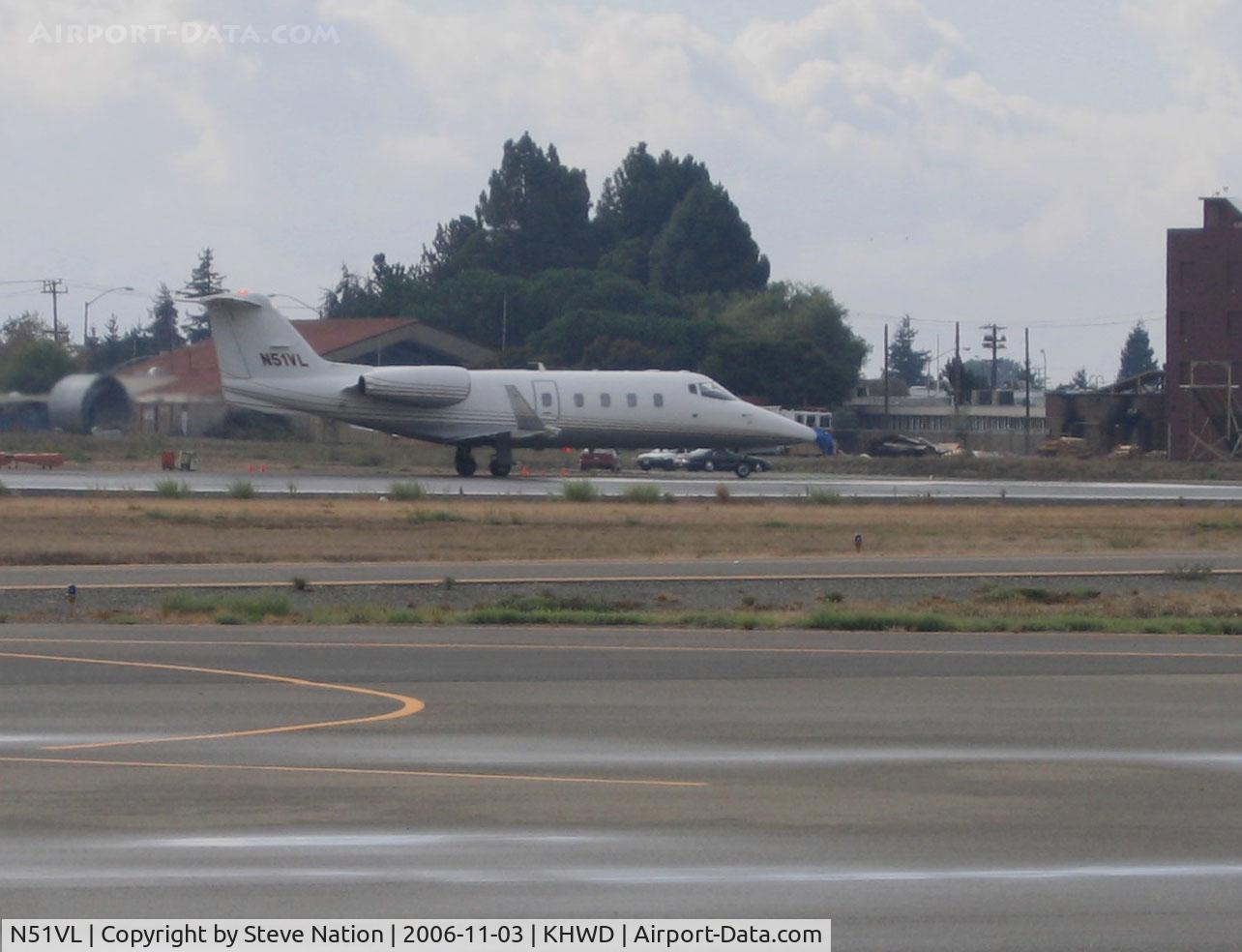 N51VL, 1955 Gates Learjet 55 C/N 116, Locally-based SP Aviation 1999 Gates Learjet 55 rolling for takeoff @ Hayward Executive Airport, CA (re-registered N801GJ same owner in 2011 and active)