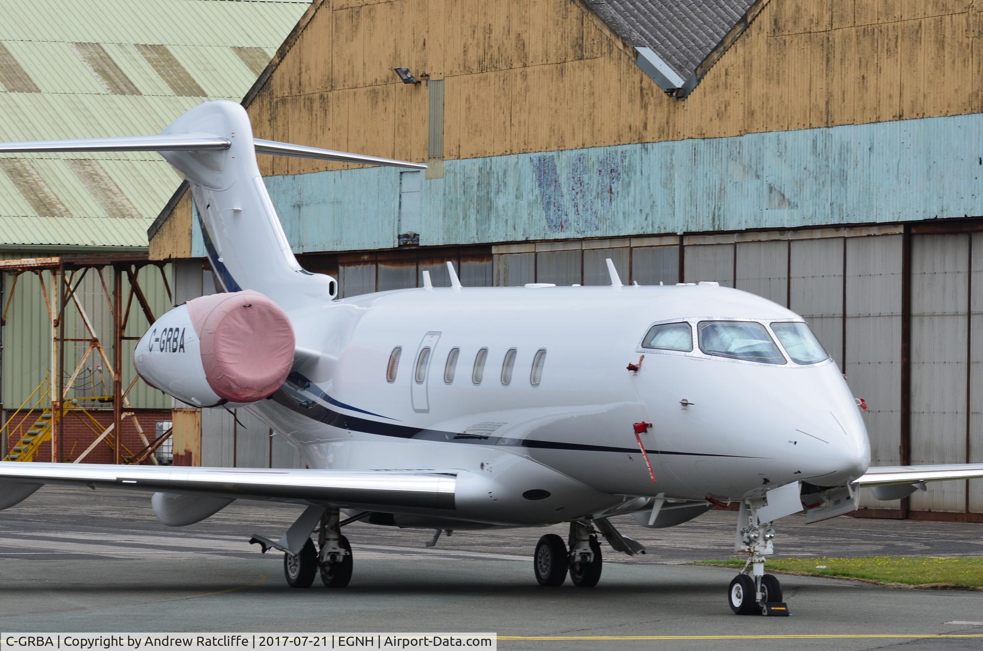 C-GRBA, 2009 Bombardier Challenger 300 (BD-100-1A10) C/N 20277, Photographed parked on the main apron at Blackpool, possibly in connection with The Open Golf at Royal Birkdale, Southport