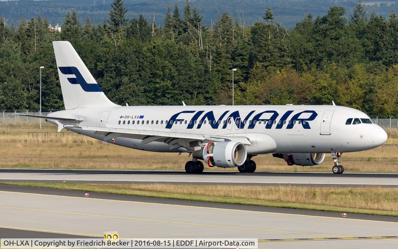 OH-LXA, 2001 Airbus A320-214 C/N 1405, decellerating after touchdown on RW07L